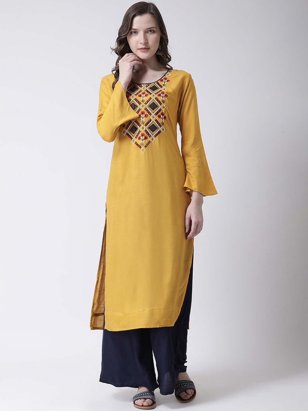 

Charitra Ethnic Motifs Embroidered Thread Work Kurti with Palazzos, Mustard