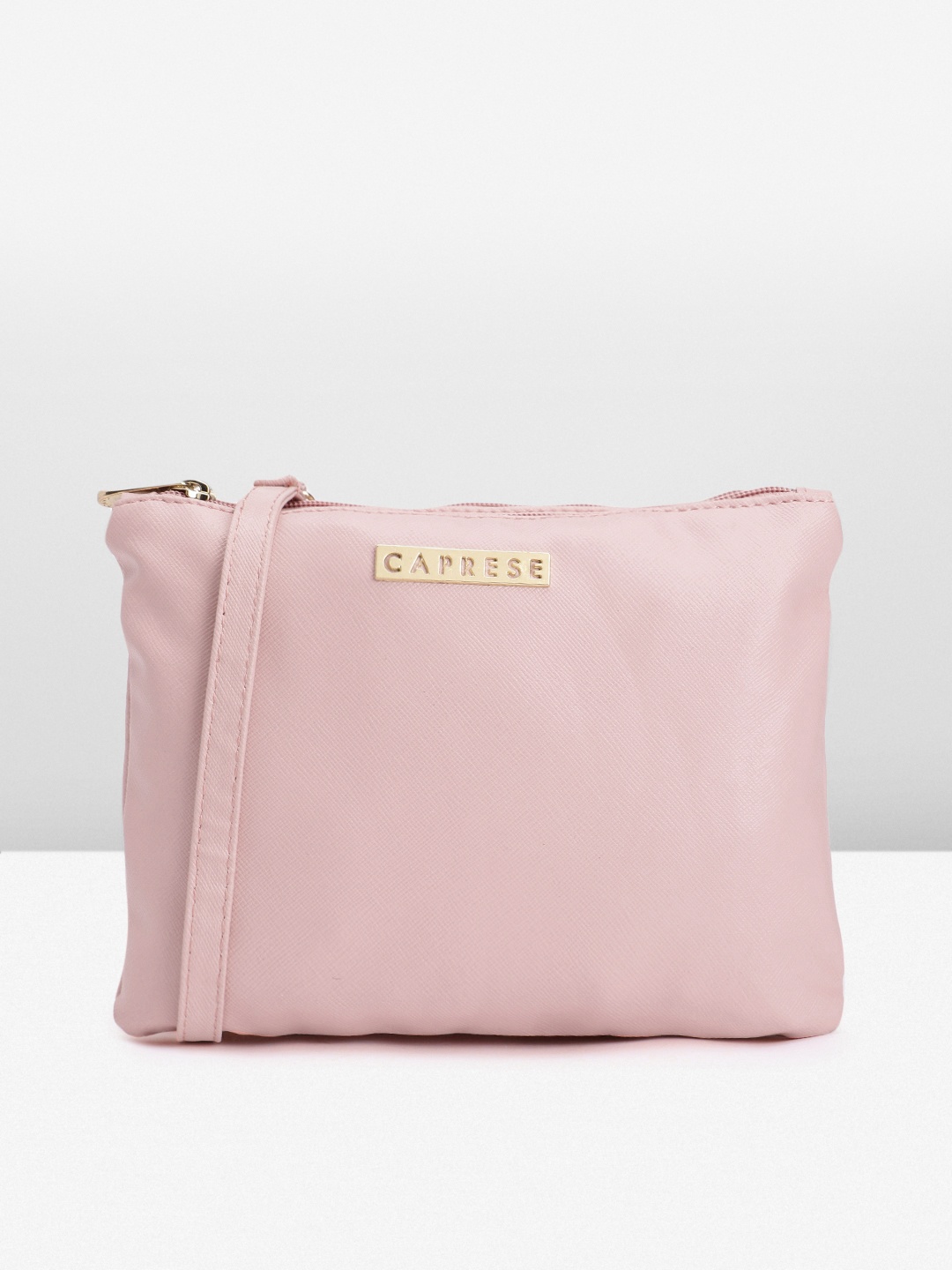 

Caprese Women Solid Sling Bag, Pink