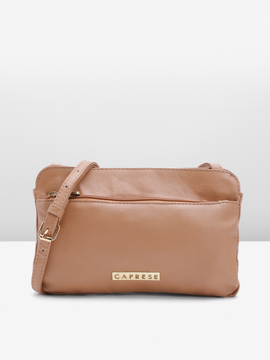 

Caprese Solid Structured Sling Bag, Nude