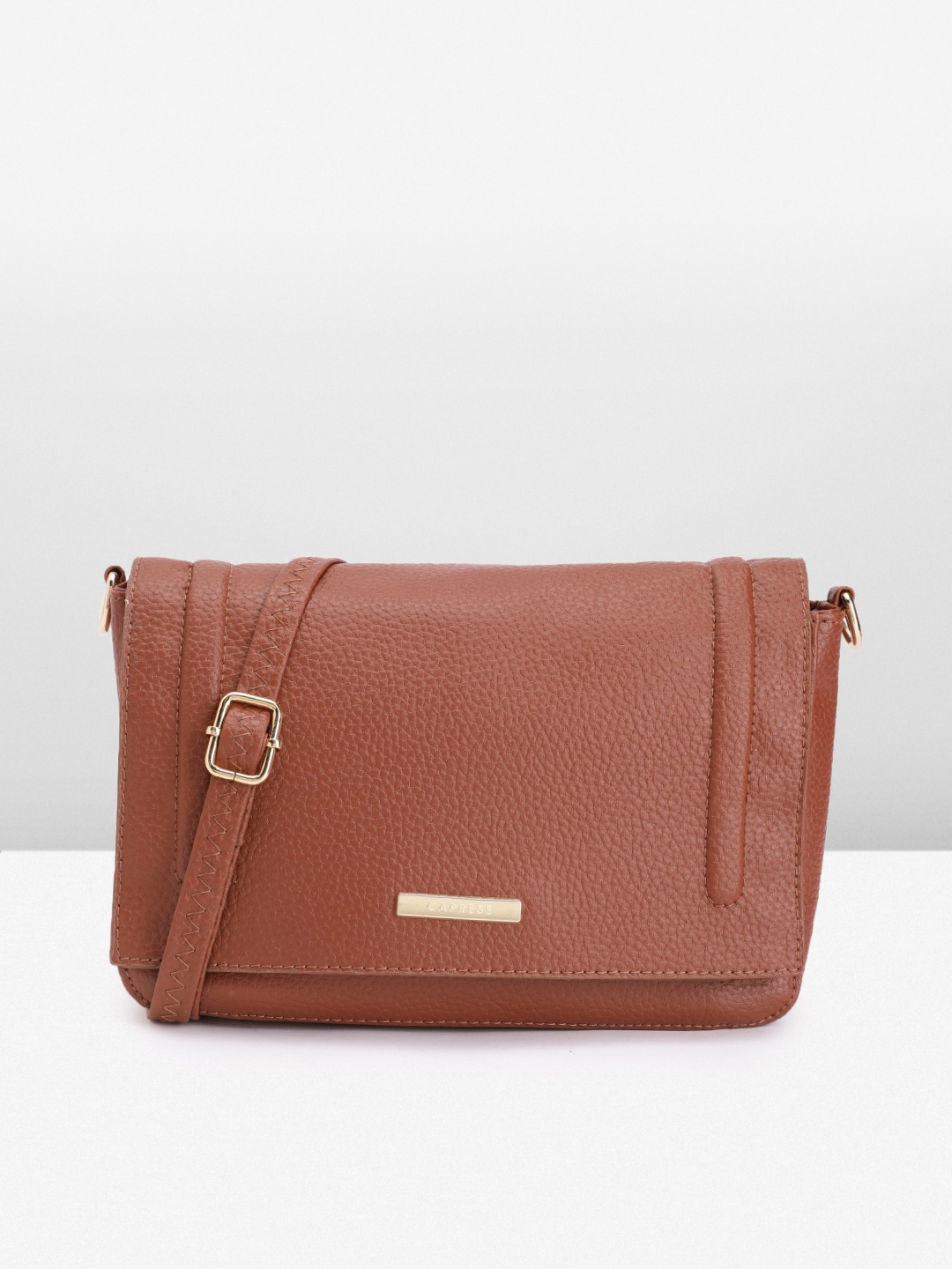 

Caprese Women Solid Sling Bag, Brown
