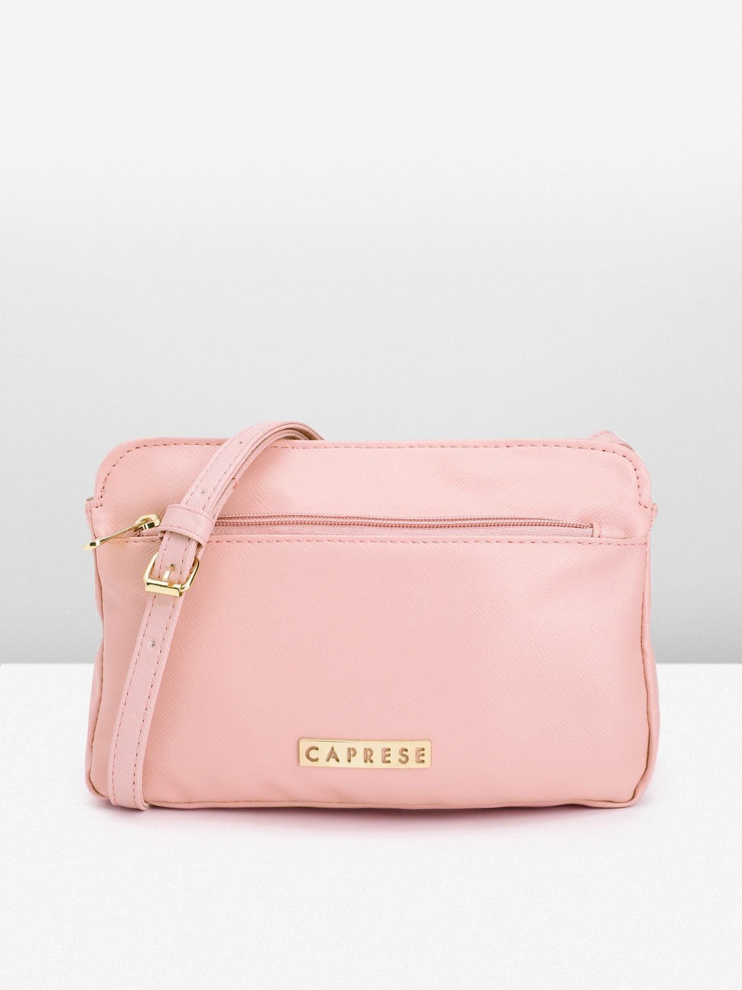 

Caprese Pink Solid Sling Bag