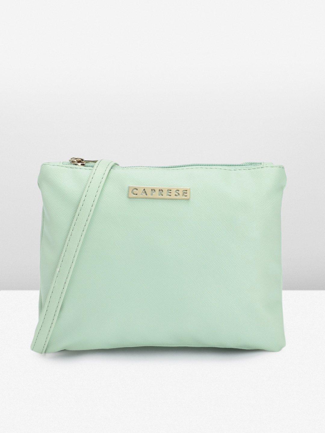 

Caprese Women Solid Sling Bag, Green