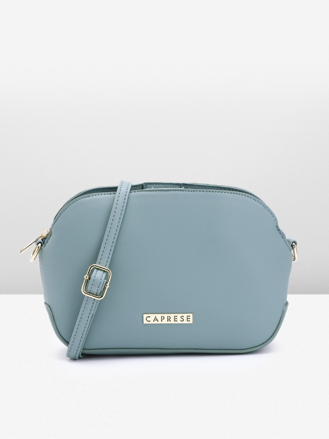 

Caprese Solid Structured Sling Bag, Blue
