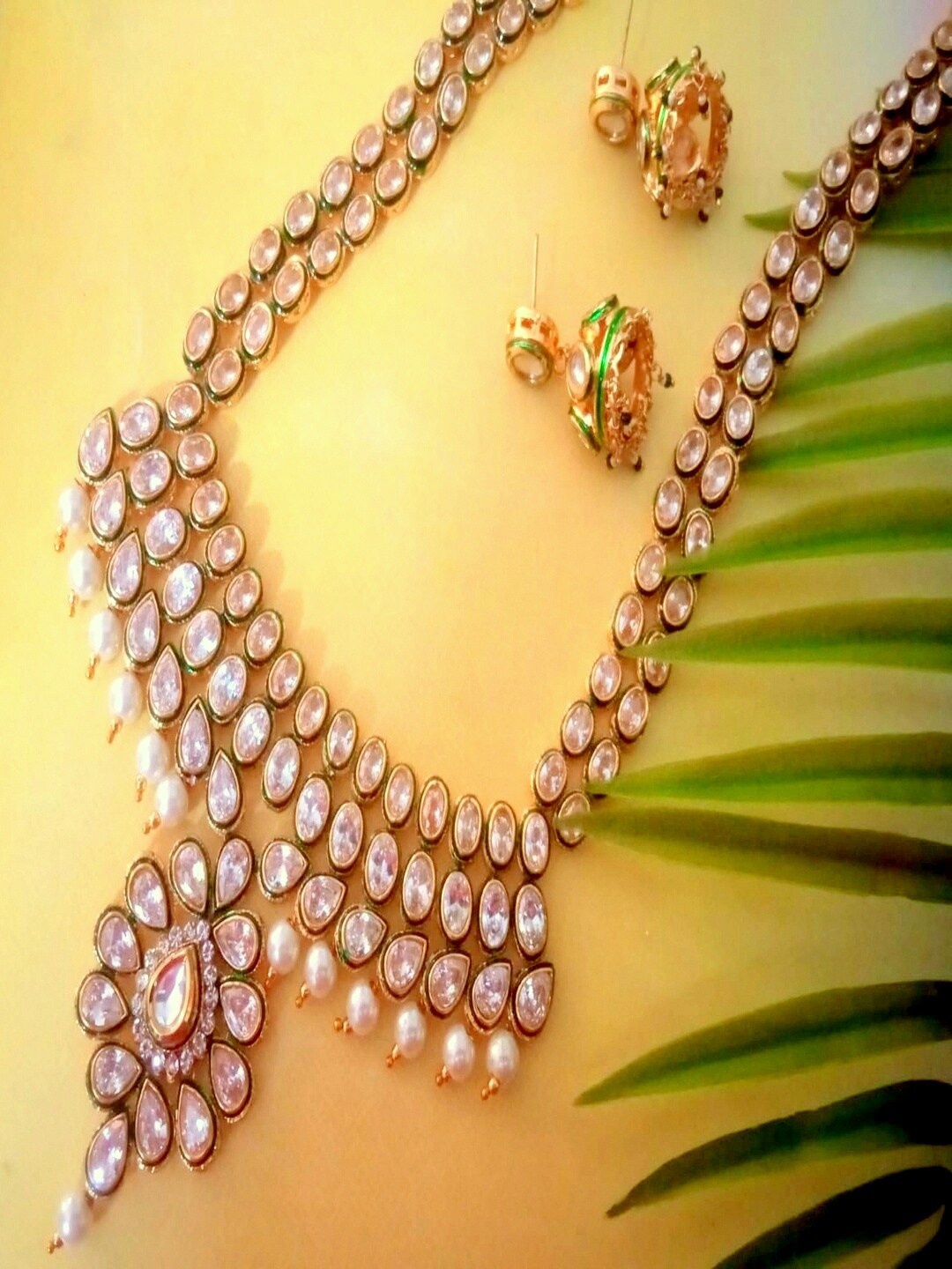 

Runjhun Gold-Plated Stone-Studded Designer Jewellery Set