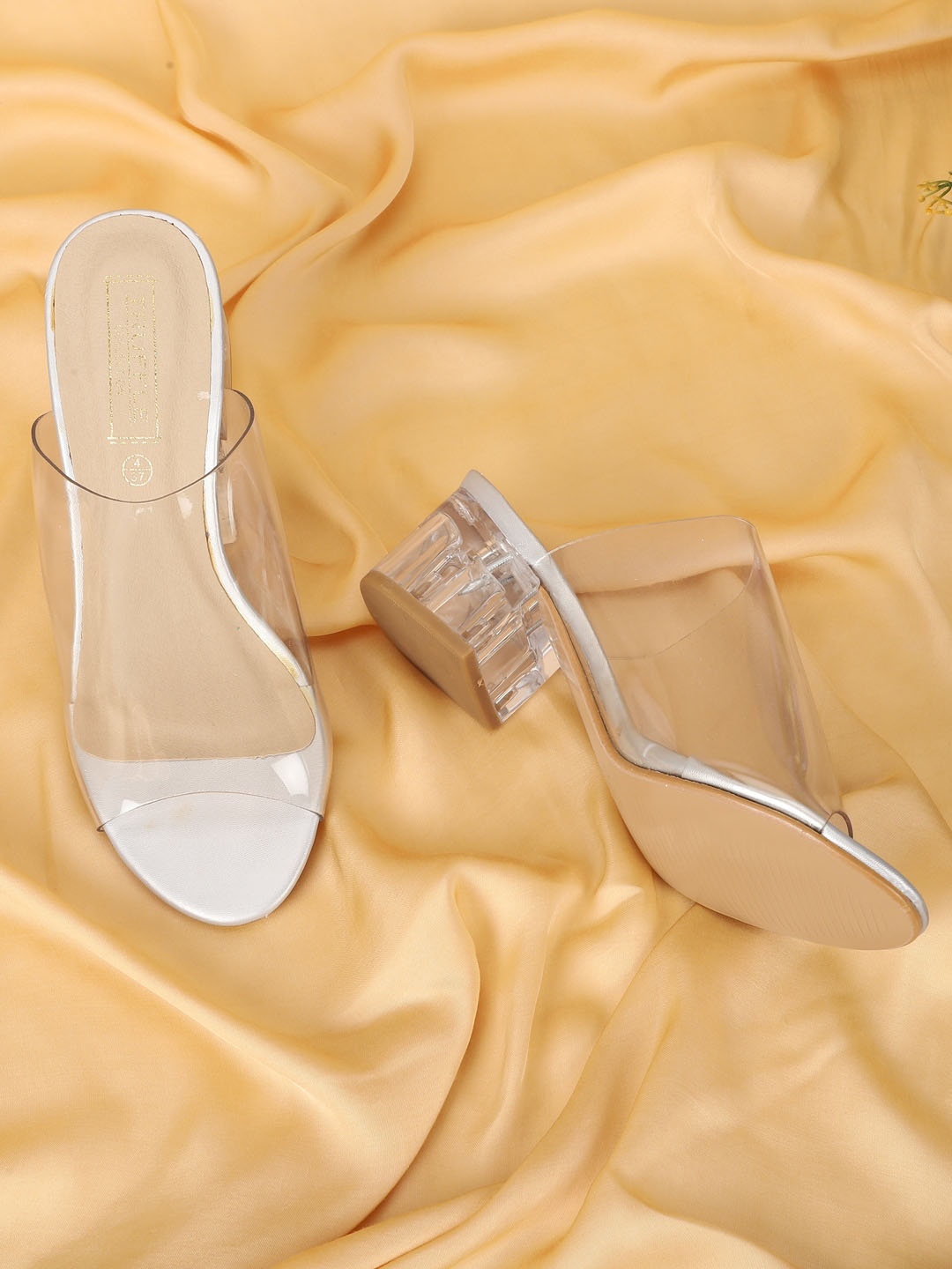 

Truffle Collection Solid PU Block Mules, Transparent