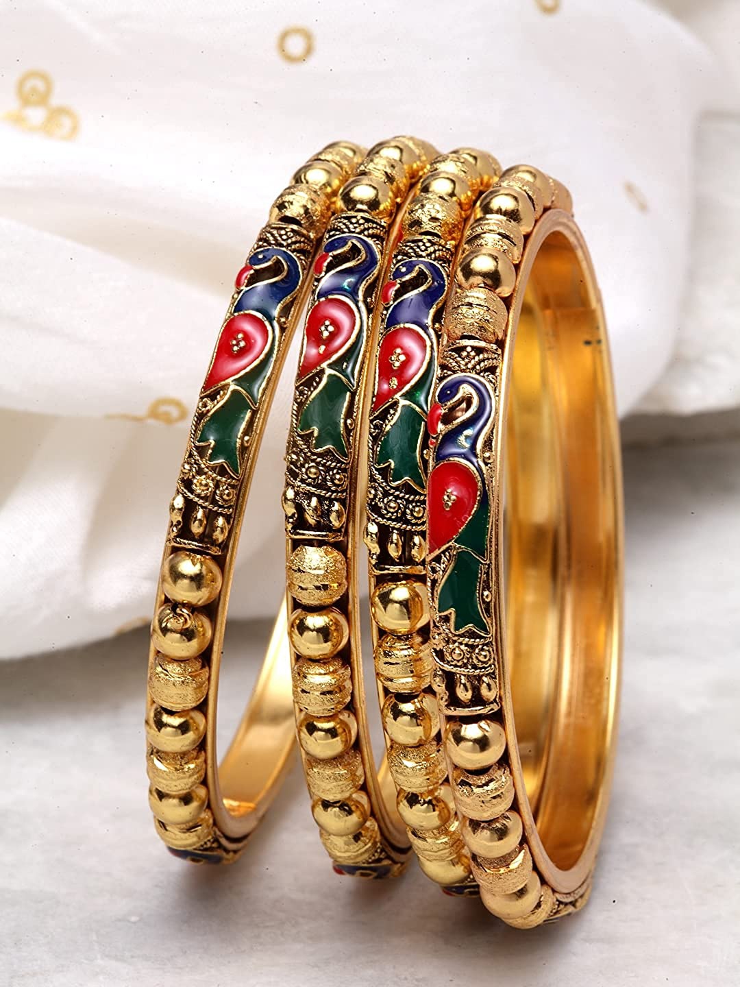 

The Pari Set Of 4 Gold-Plated Bangles