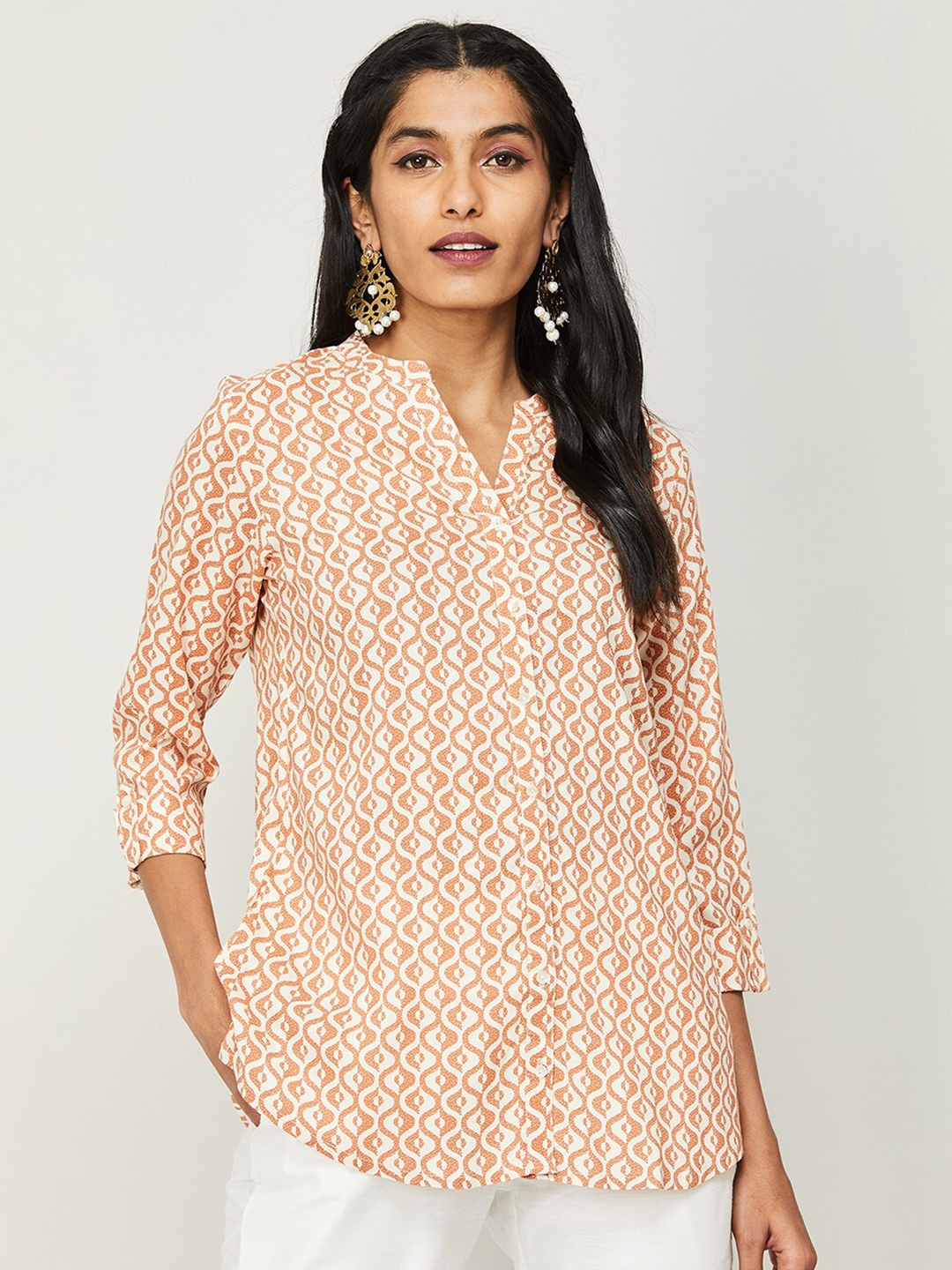

Melange by Lifestyle Ethnic Motifs Printed Mandarin Collar Viscose Rayon Kurti, Peach