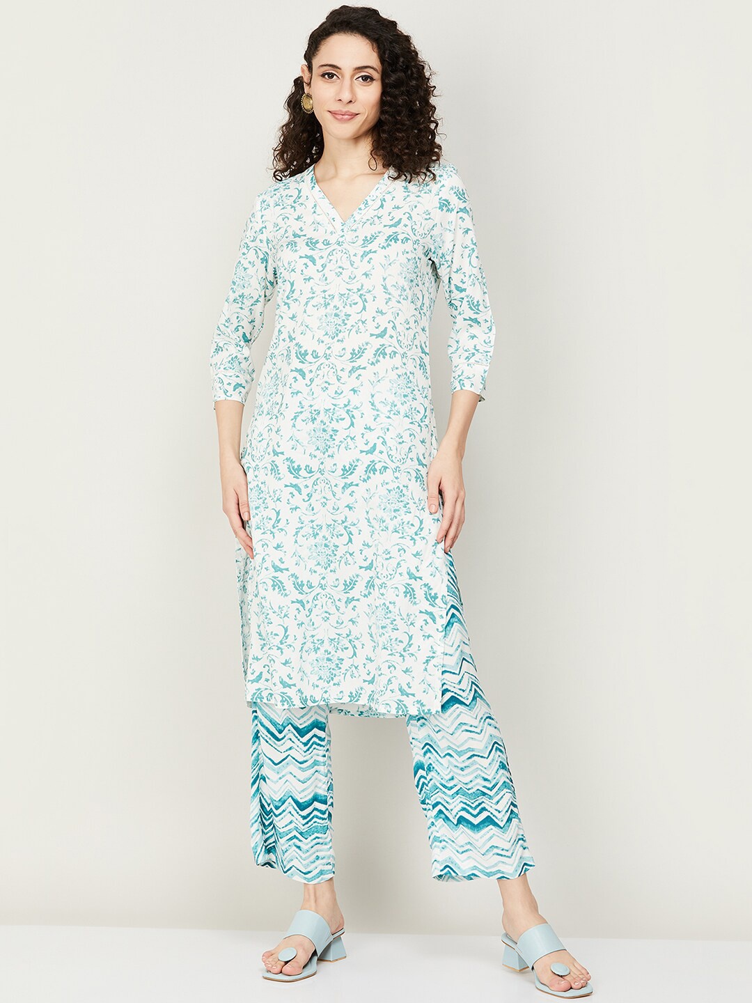 

Melange by Lifestyle Ethnic motifs Printed V-Neck Straight Kurta with Trousers, White
