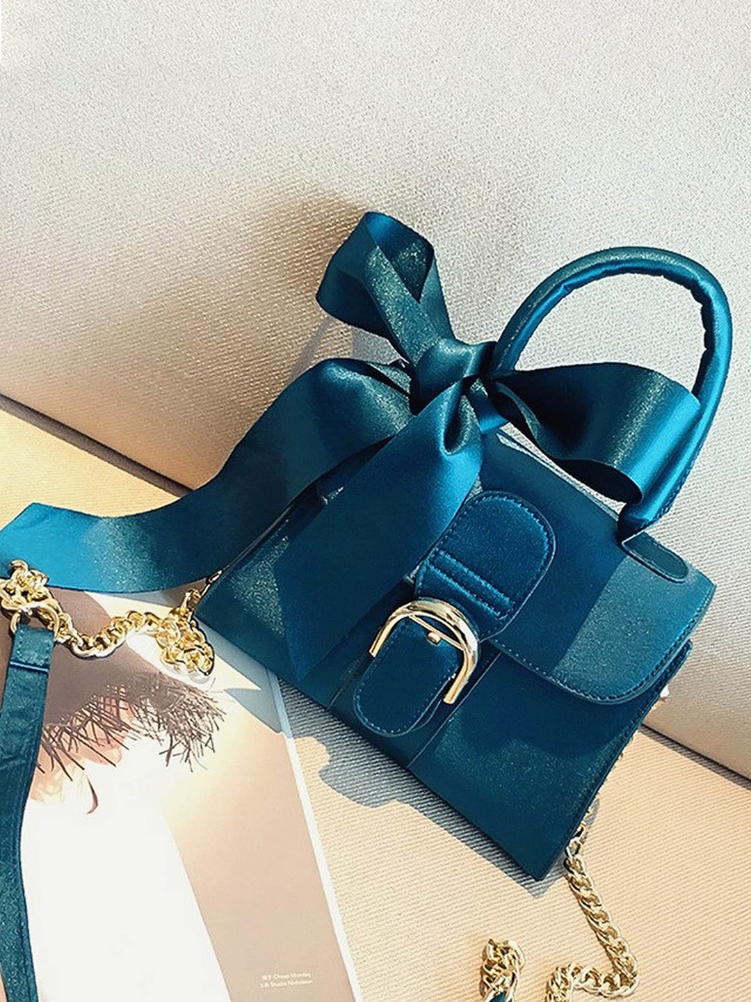 

Diva Dale Textured Structured Handheld Bag With Bow Detail, Teal