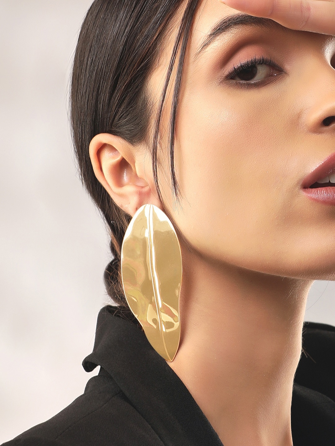 

Rubans Voguish Gold Plated Leaf Statement Drop Earrings