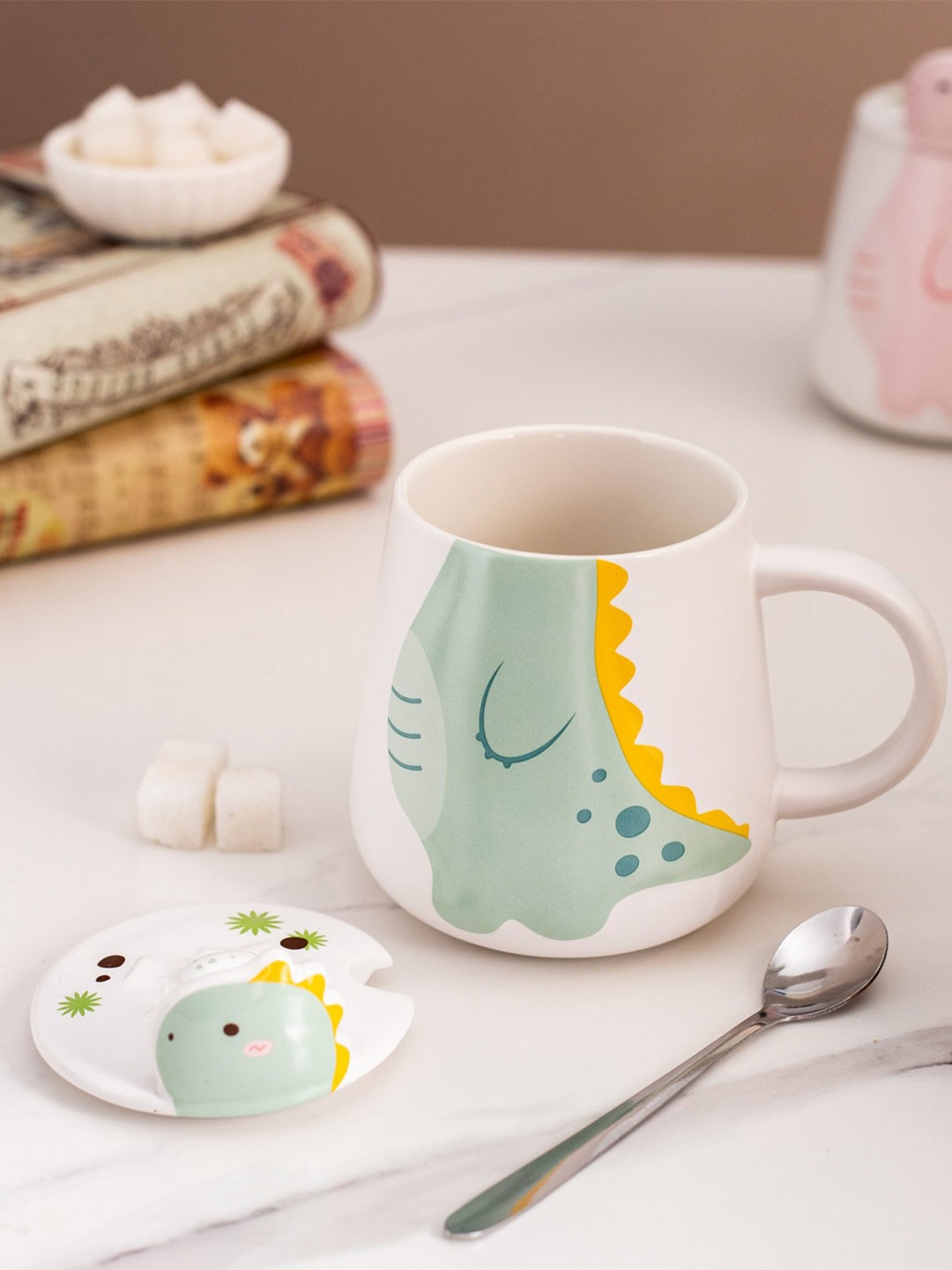 

THEDECORKART Dino White & Green 3 Pcs Textured Mug with Lid and Spoon 100 ml