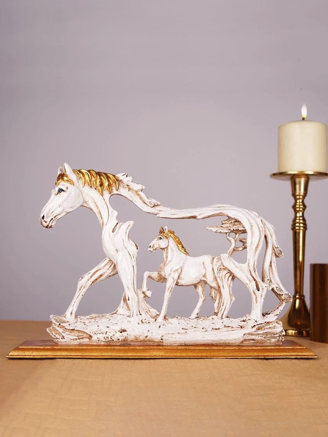 

THE ARTMENT White & Gold-Toned Galloping Horse Table Showpiece