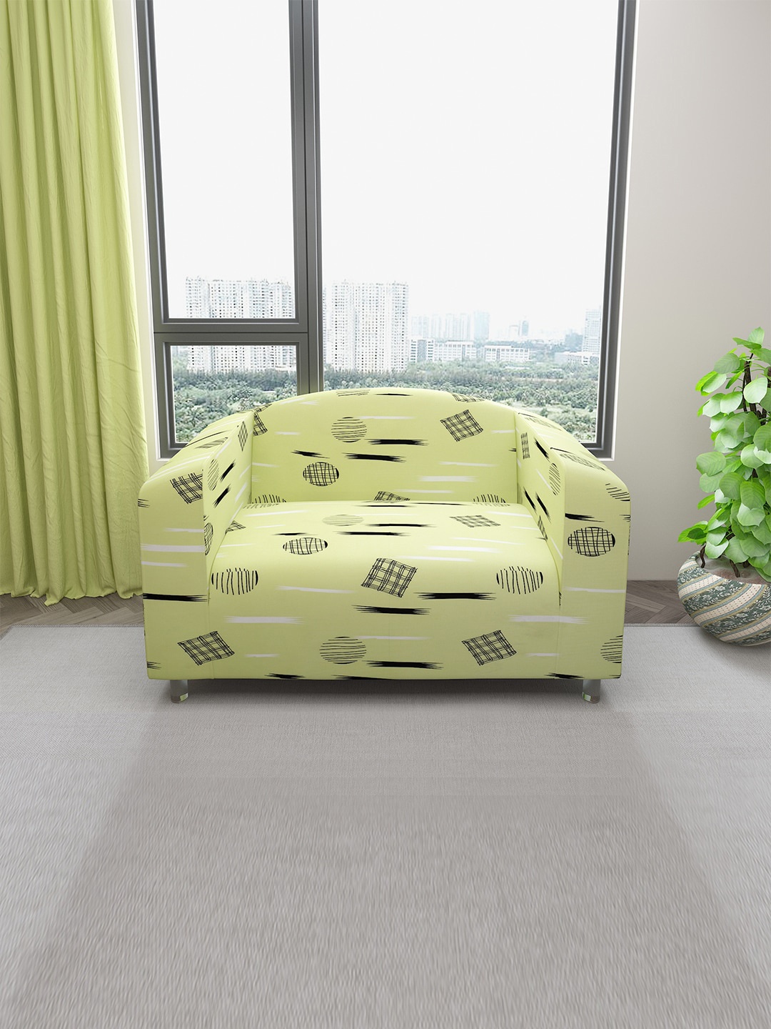

DREAM CARE Green & Black Printed Stretchable Two Seater Sofa Slipcover With Foam Stick