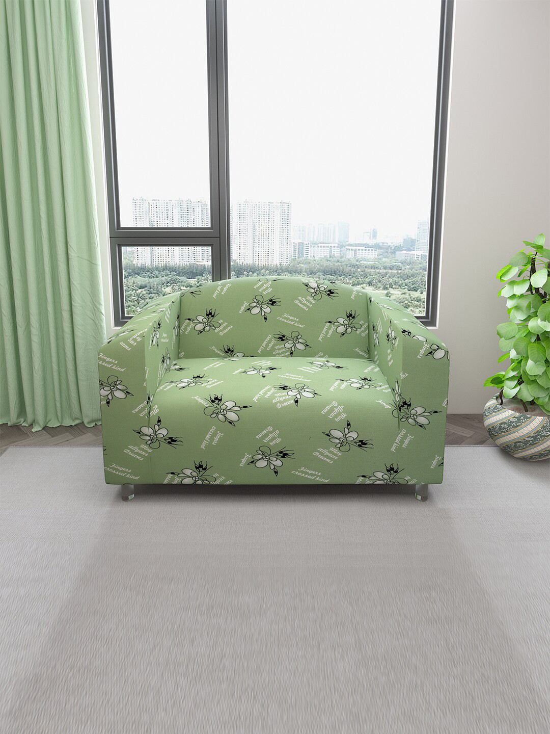 

DREAM CARE Green & White Printed 2-Seater Stretchable Sofa Slipcover With Foam Sticks