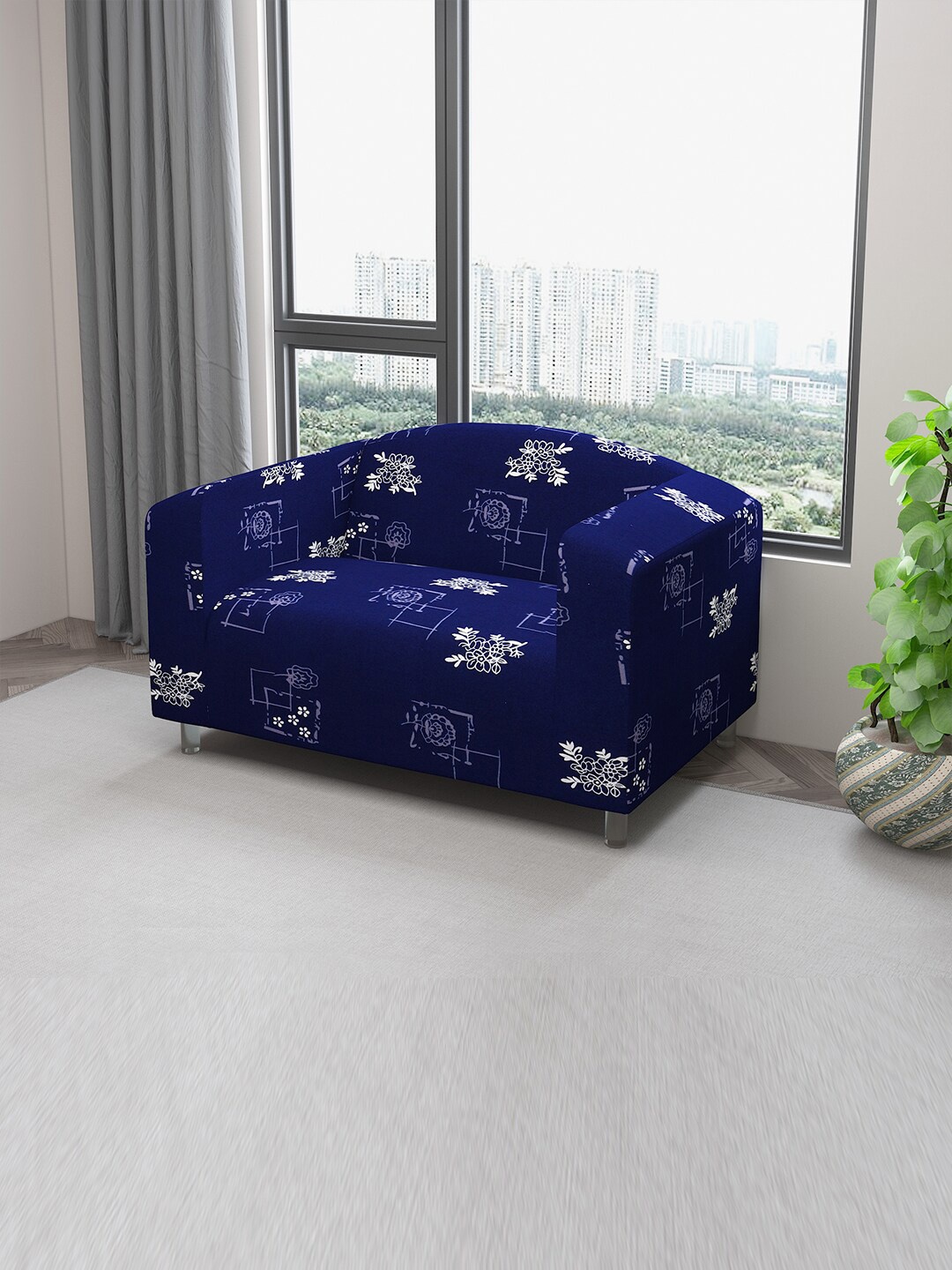 

DREAM CARE Blue Floral Printed Stretchable 2-Seater Sofa Cover With Anti Slip Foam Sticks