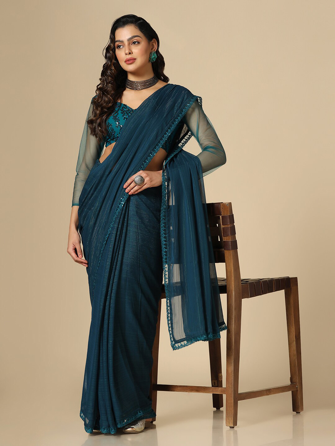 

Satrani Border Embroidered Party Wear Saree, Teal