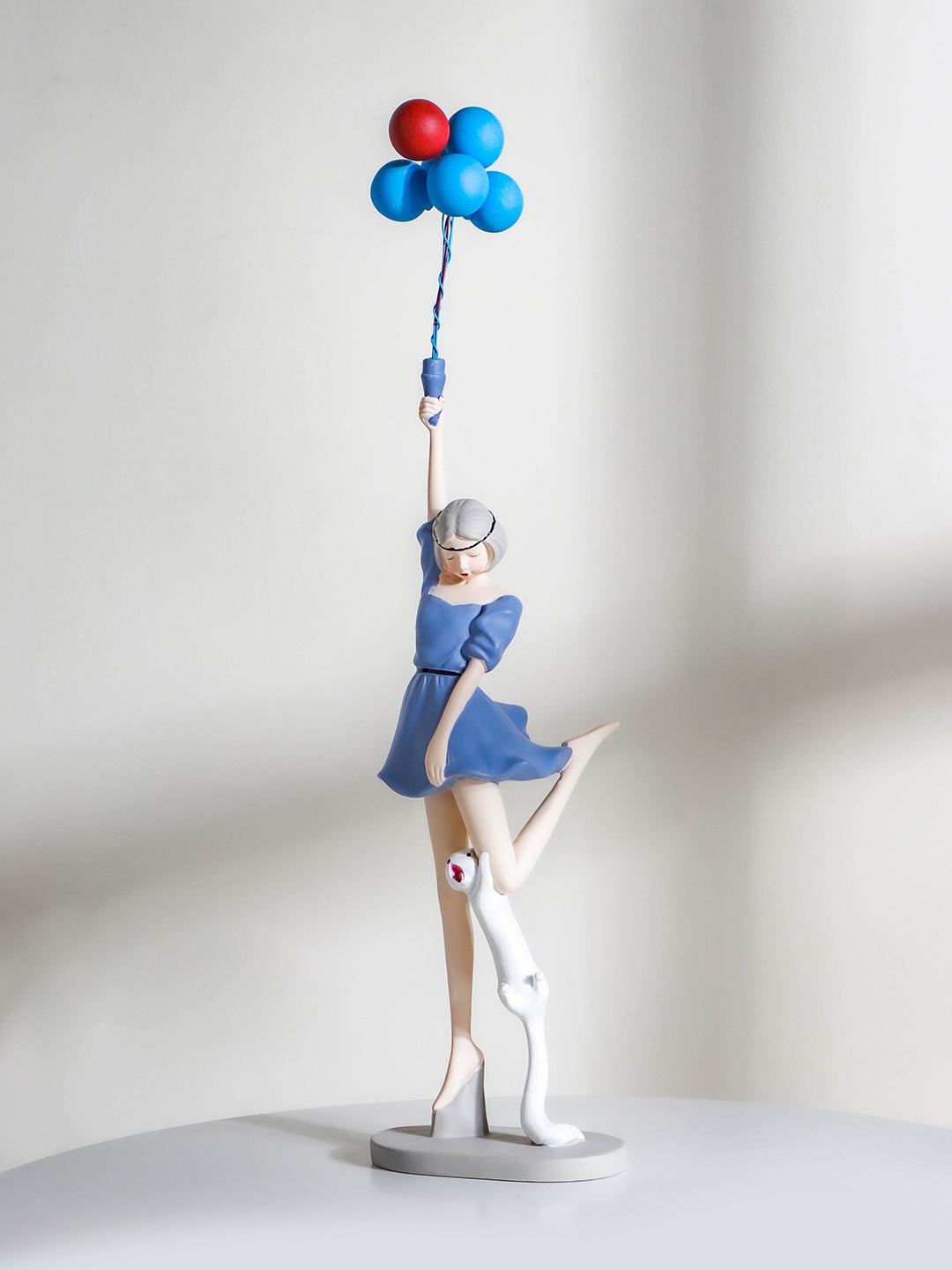 

Nestasia Blue Girl With Balloons Showpiece