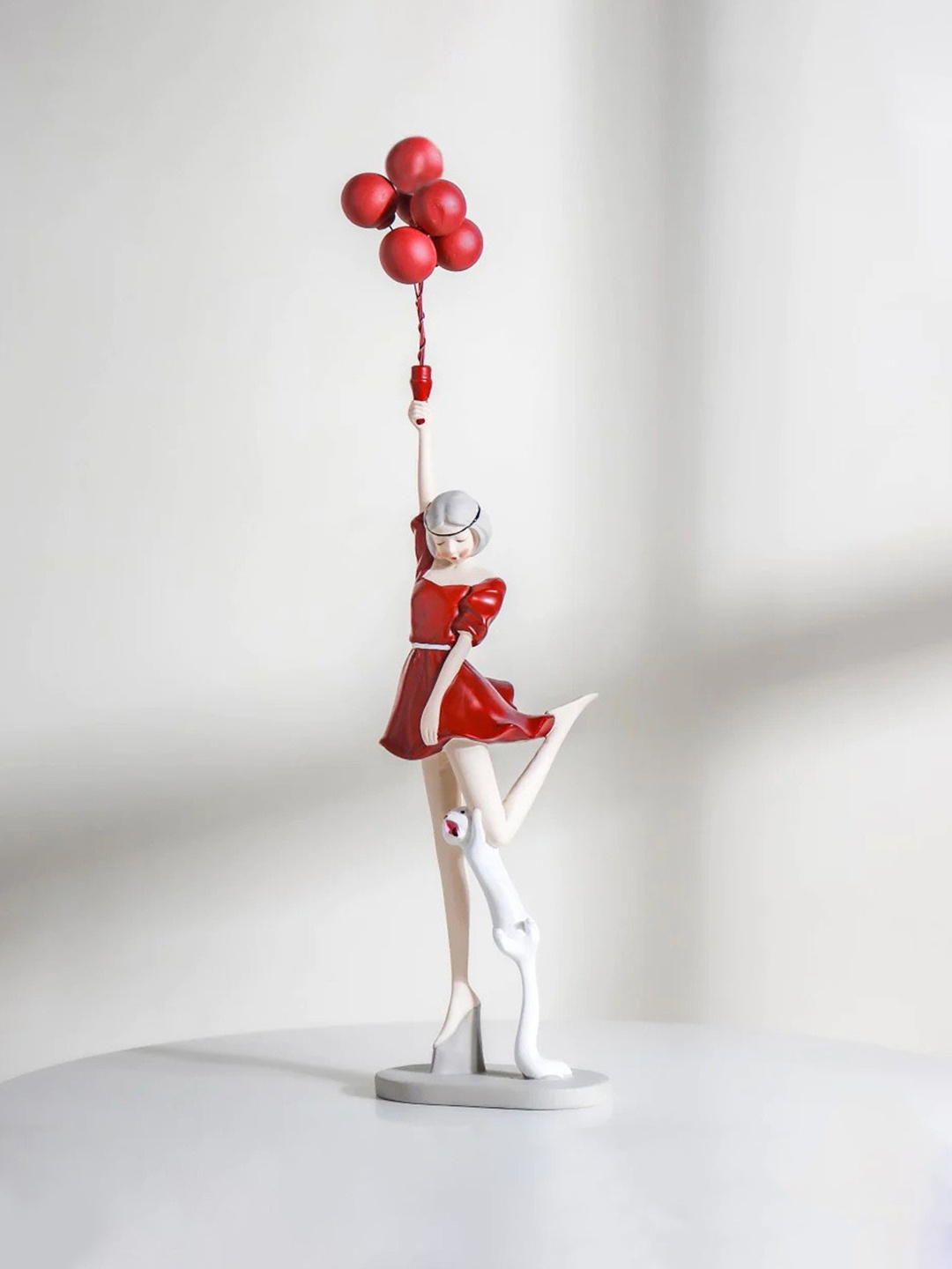 

Nestasia Red & White Girl With Balloons Showpiece