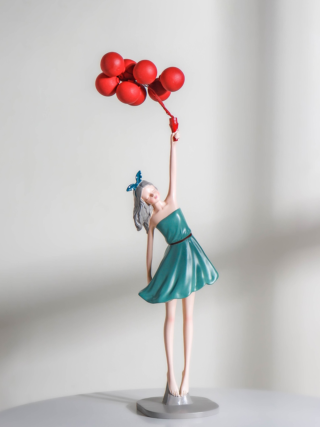 

Nestasia Green & Beige Girl With Balloons Showpiece