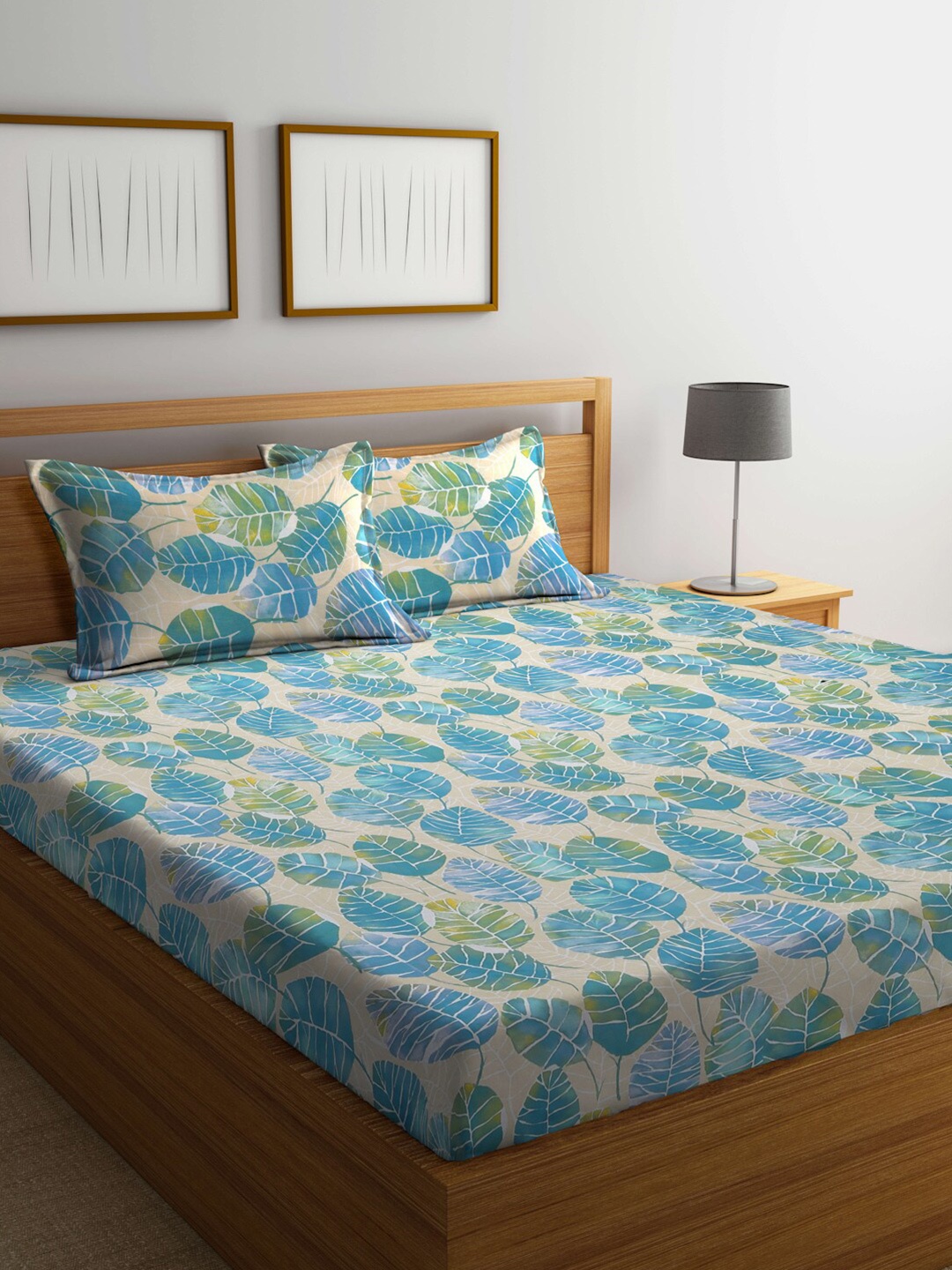 

BOMBAY DYEING Serenita Blue & Beige Printed 144 TC Flat Queen Bedsheet & Pillow Covers