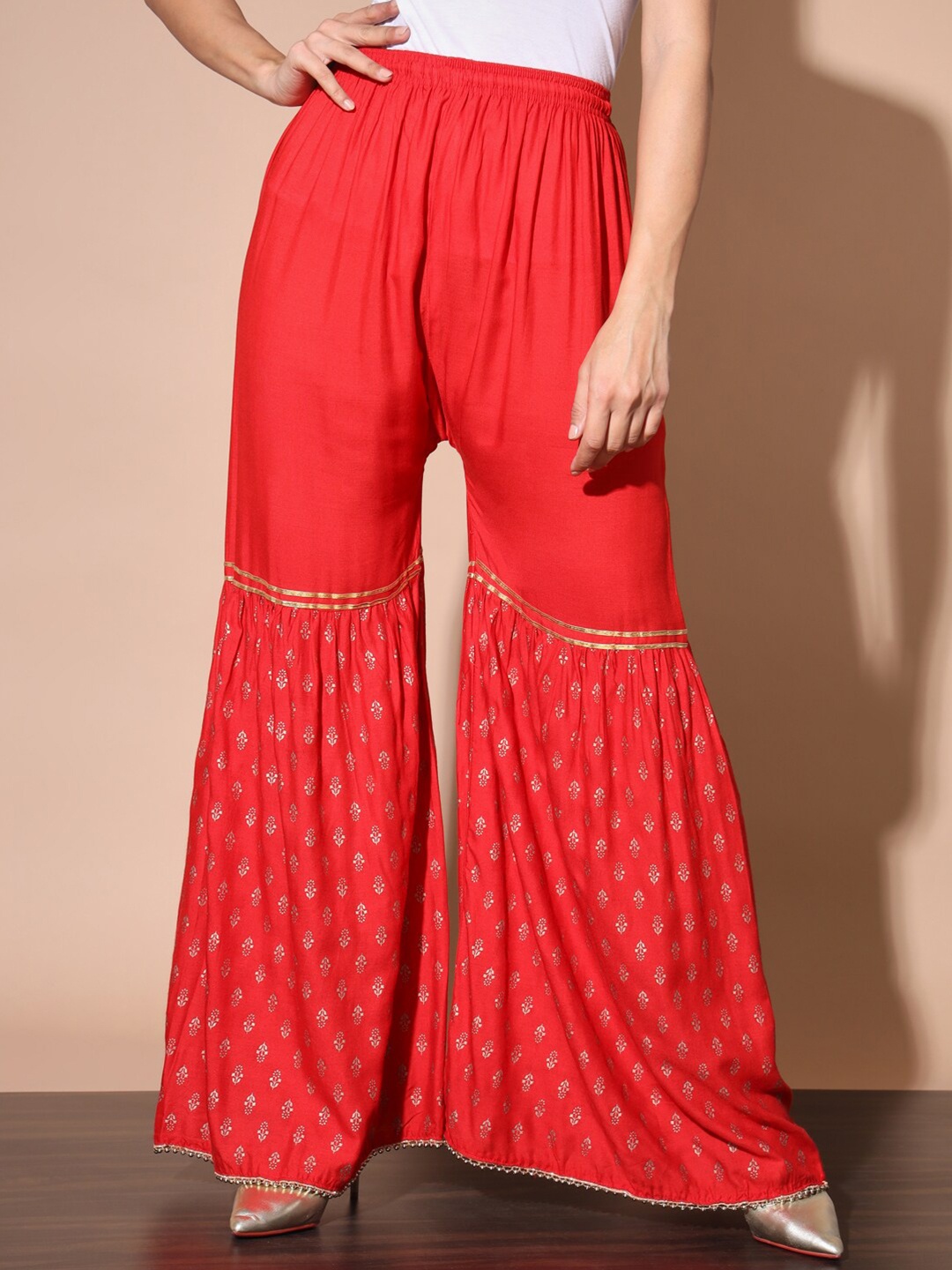 

BUY NEW TREND Women Ethnic Motifs Printed Flared Knitted Ethnic Palazzos, Red
