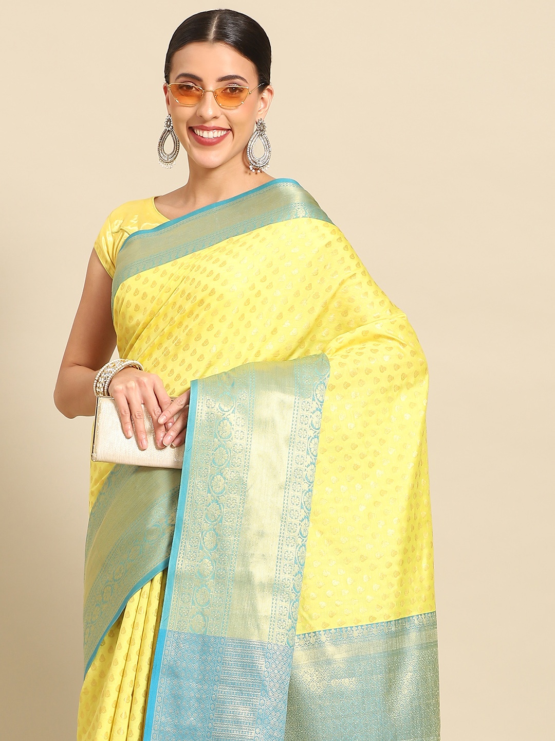 

Silk Land Ethnic Motifs Zari Kanjeevaram Saree, Yellow