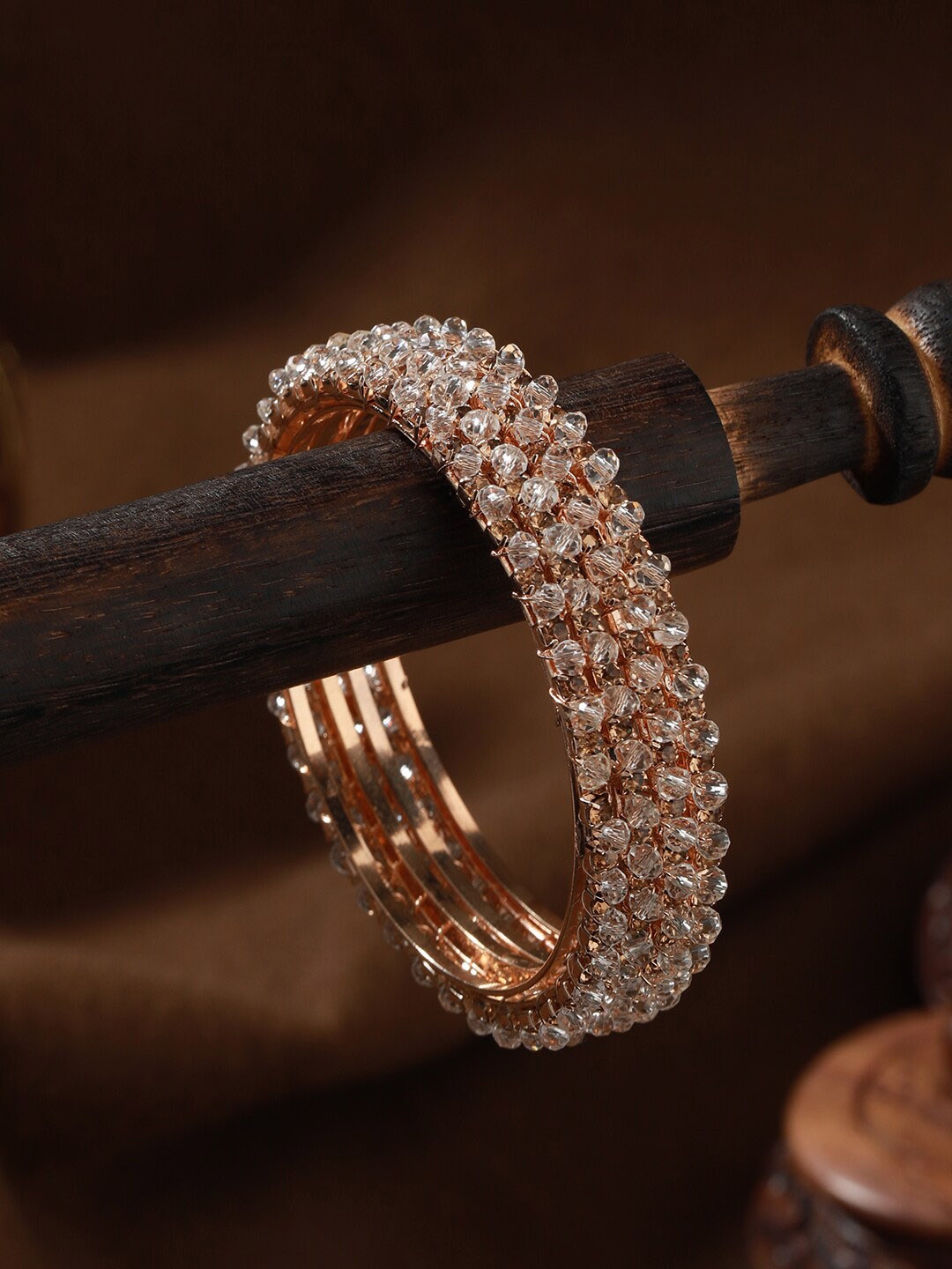 

Jazz and Sizzle Set of 4 Rose Gold-Plated Crystal Studded Bangles