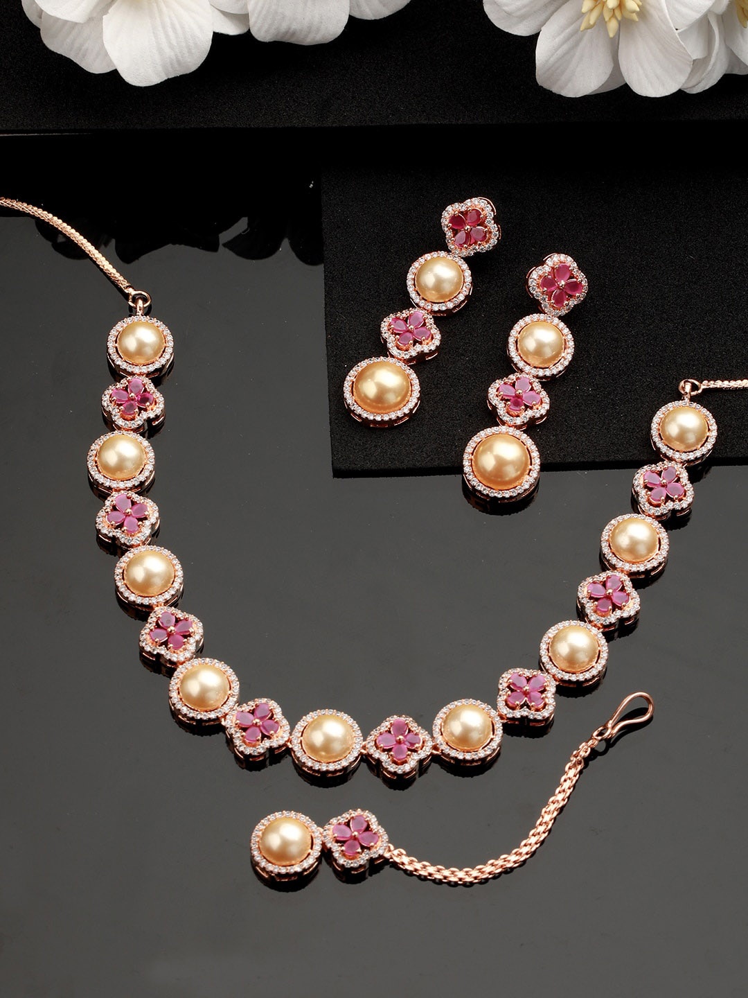 

Jazz and Sizzle Gold-Plated AD Studded Necklace and Earrings & with Maang Tika, Pink