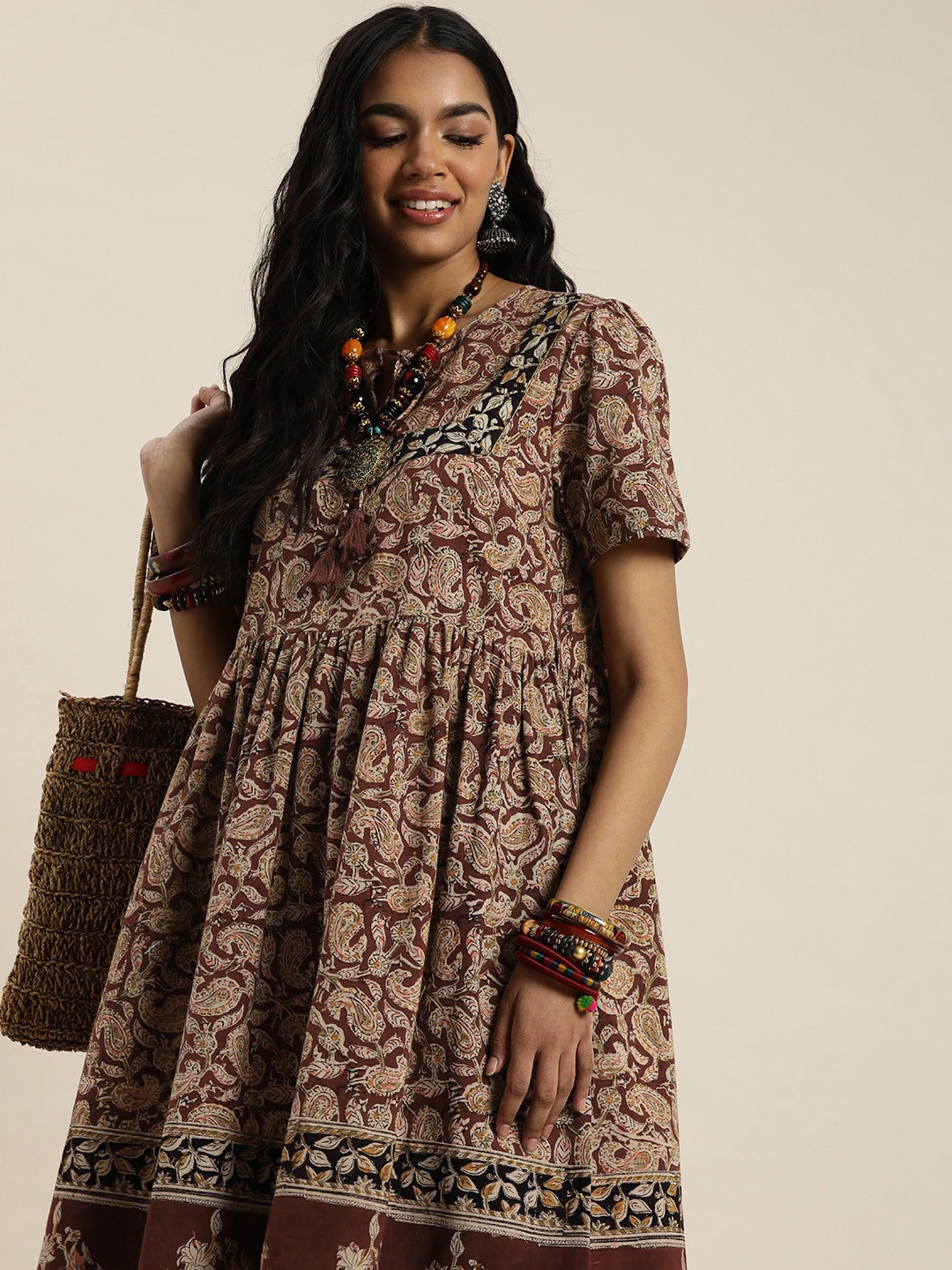 

Taavi Kalamkari Ethnic Motifs Printed Fit & Flare Dress With Tie Up Detailing, Brown