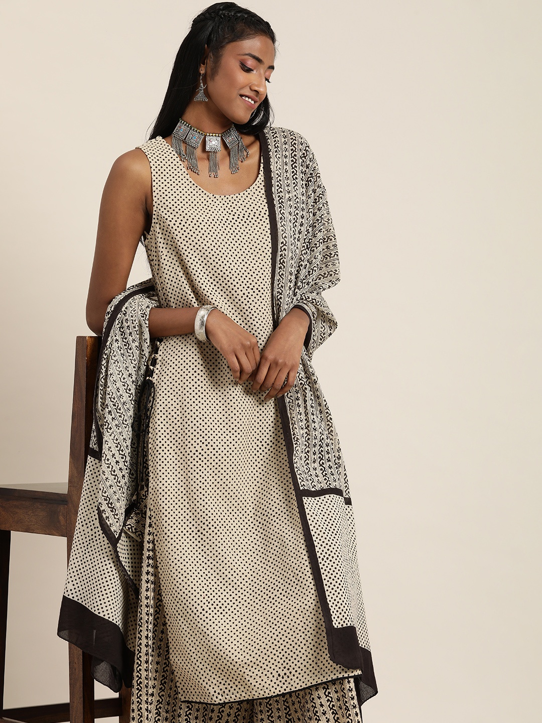 

Taavi Women Printed Regular Bagru Kurta With Palazzos & Dupatta, Beige