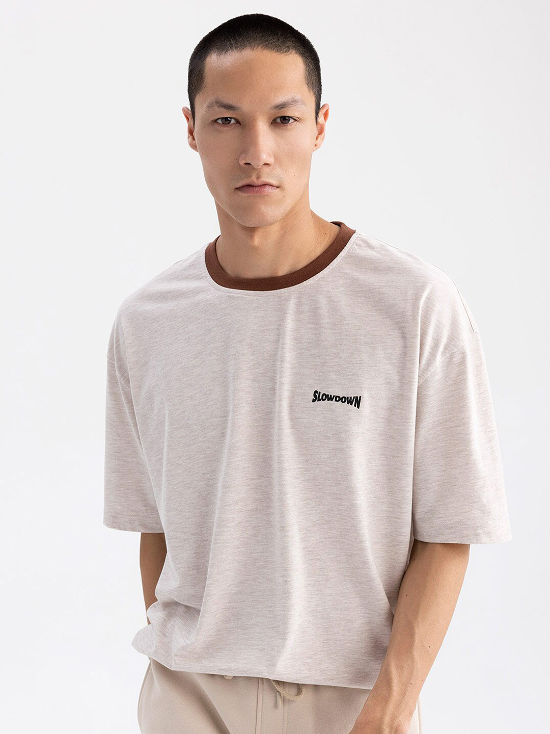 

DeFacto Round Neck Typography Printed Drop-Shoulder Sleeves T-shirt, Beige