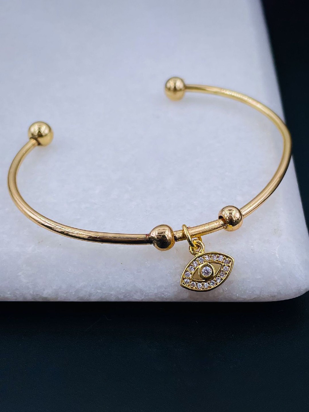 

ZIVOM Women Cubic Zirconia Gold Plated Evil Eye Free Size Cuff Bangle
