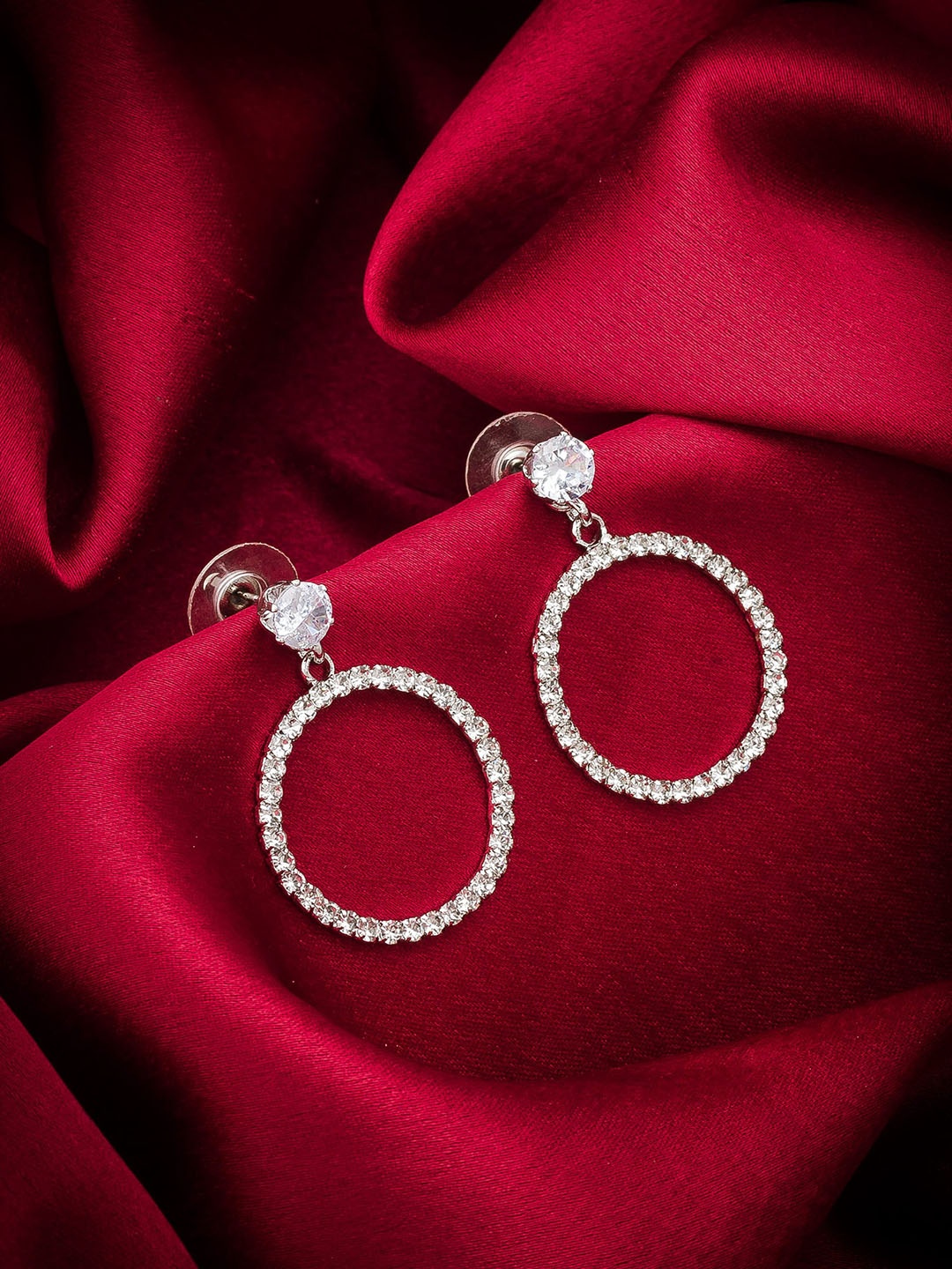

aadita Silver-Plated AD Circular Drop Earrings