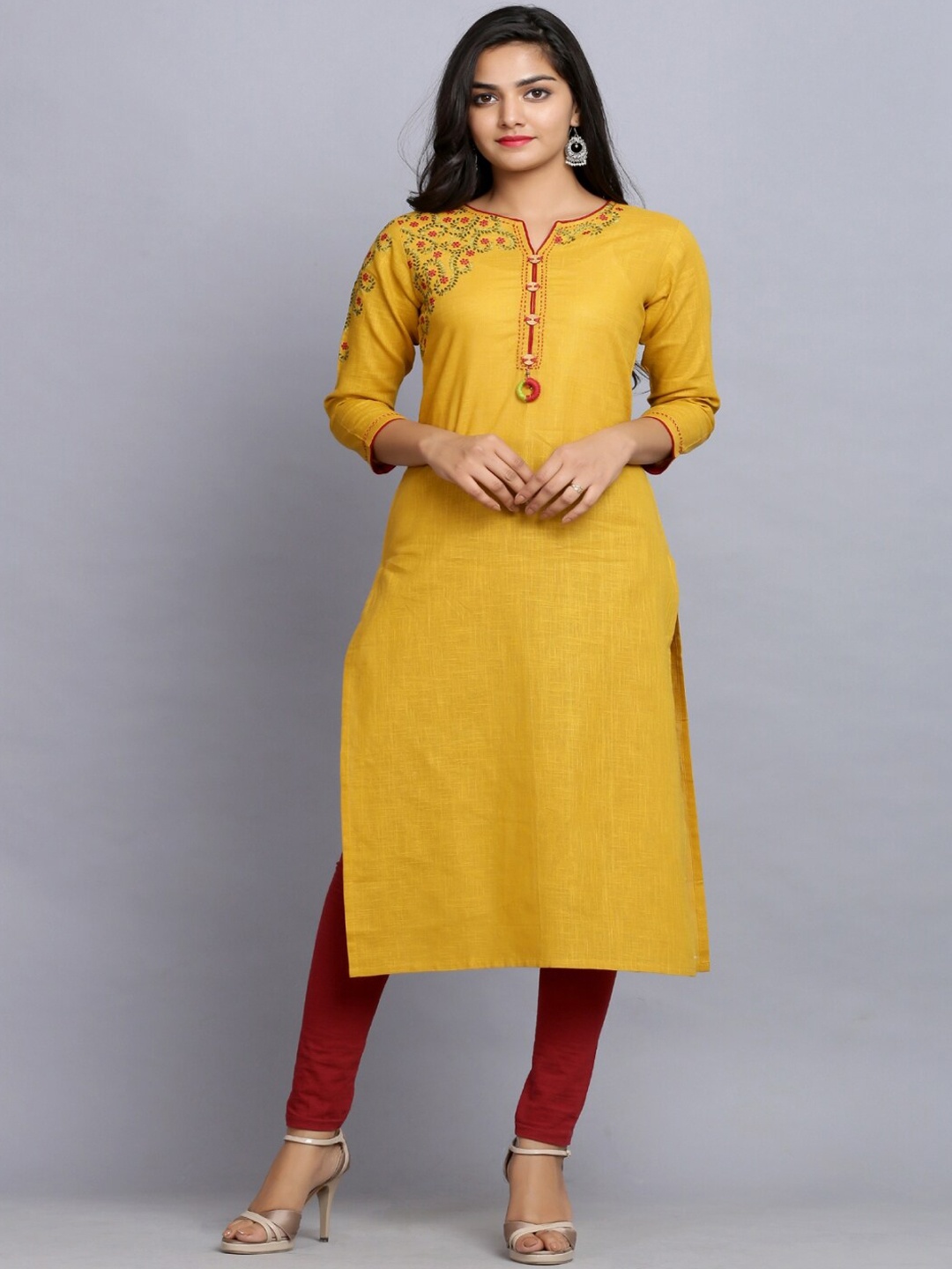 

KALINI Women Floral Yoke Design Thread Work Kurta, Mustard