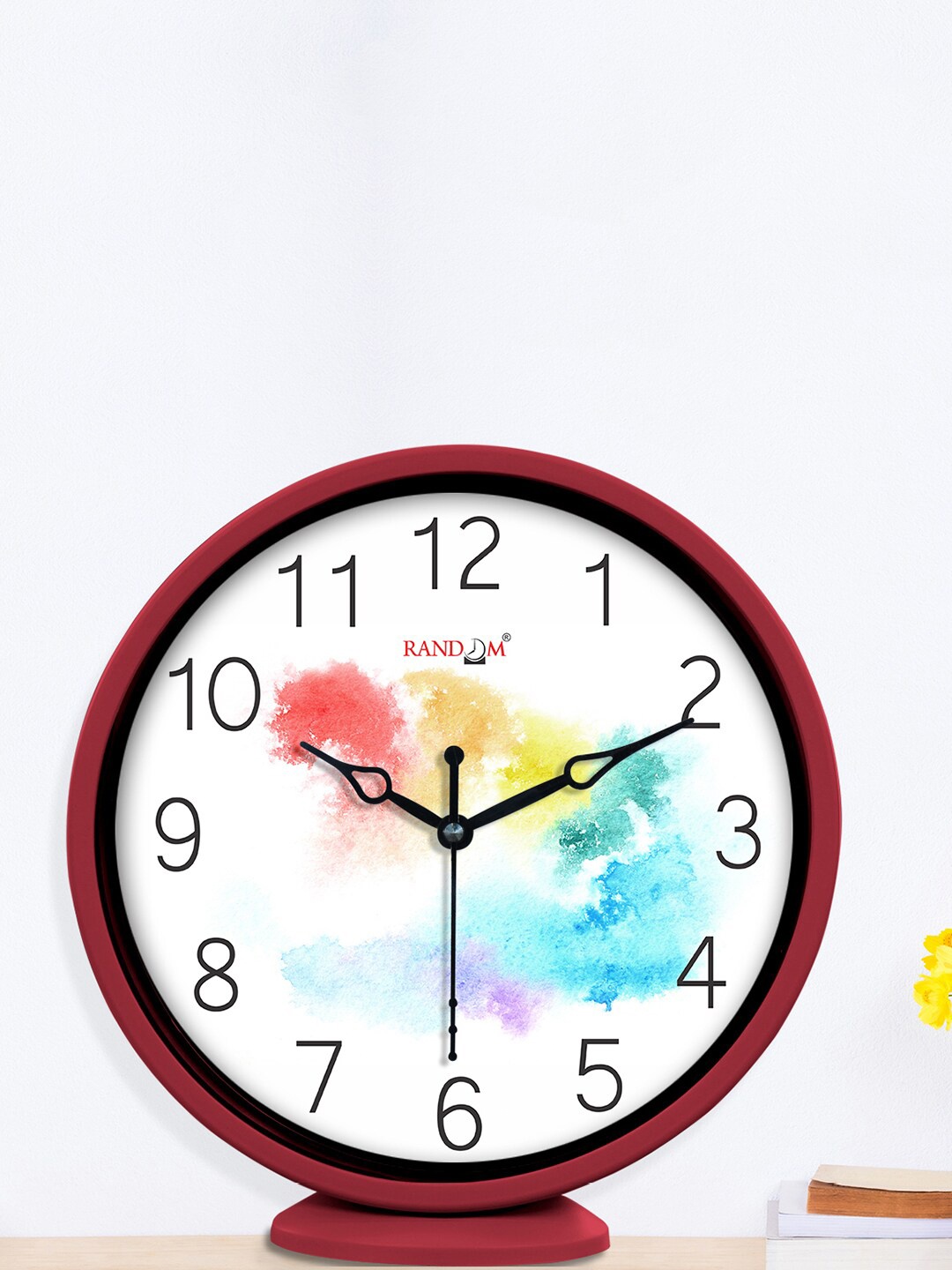 

RANDOM Holi White & Red Printed Contemporary Table Clock