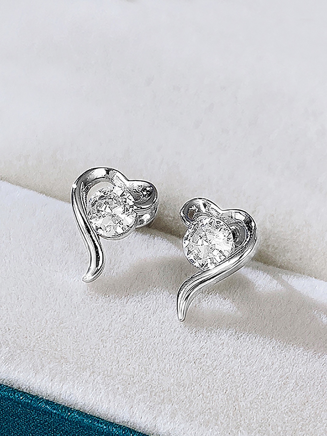 

Peora Silver-Plated Contemporary Studs Earrings