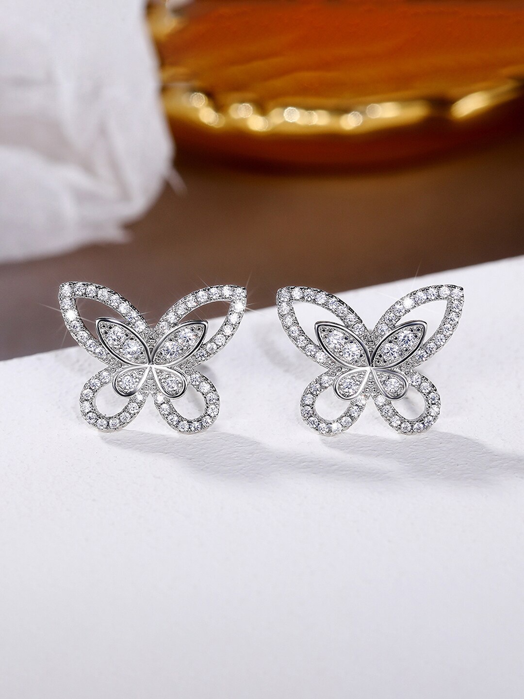 

Peora Silver-Plated Contemporary Studs Earrings