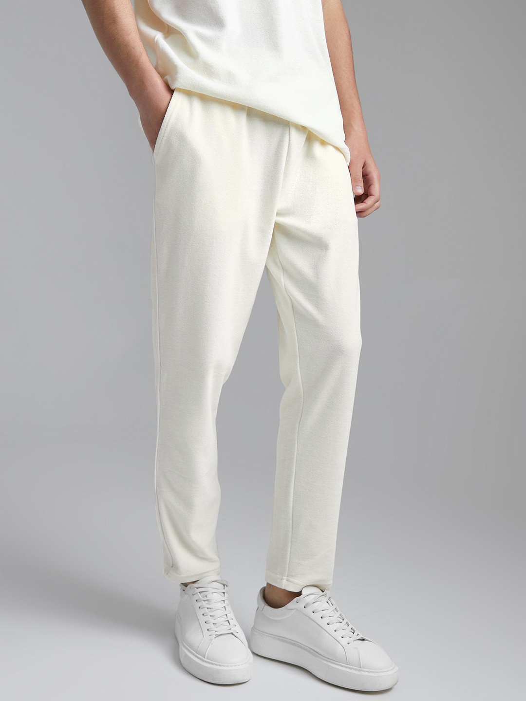 

boohooMAN Slim Fit Velour Track Pants, Off white