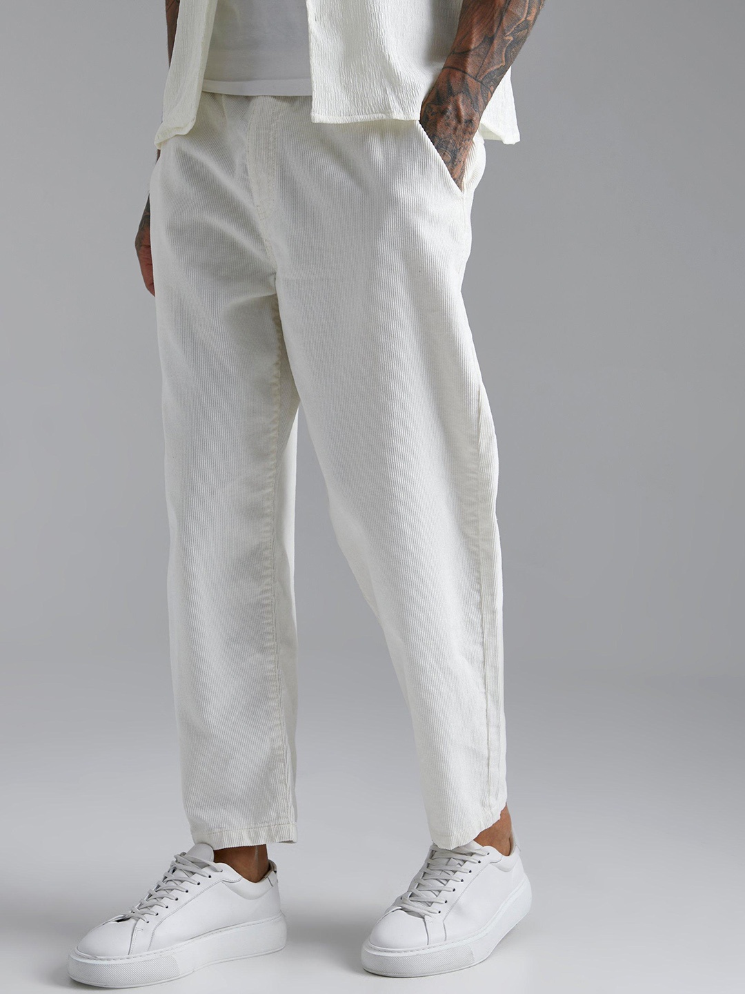 

boohooMAN Pure Cotton Elastic Waist Skate Corduroy Trousers, Off white