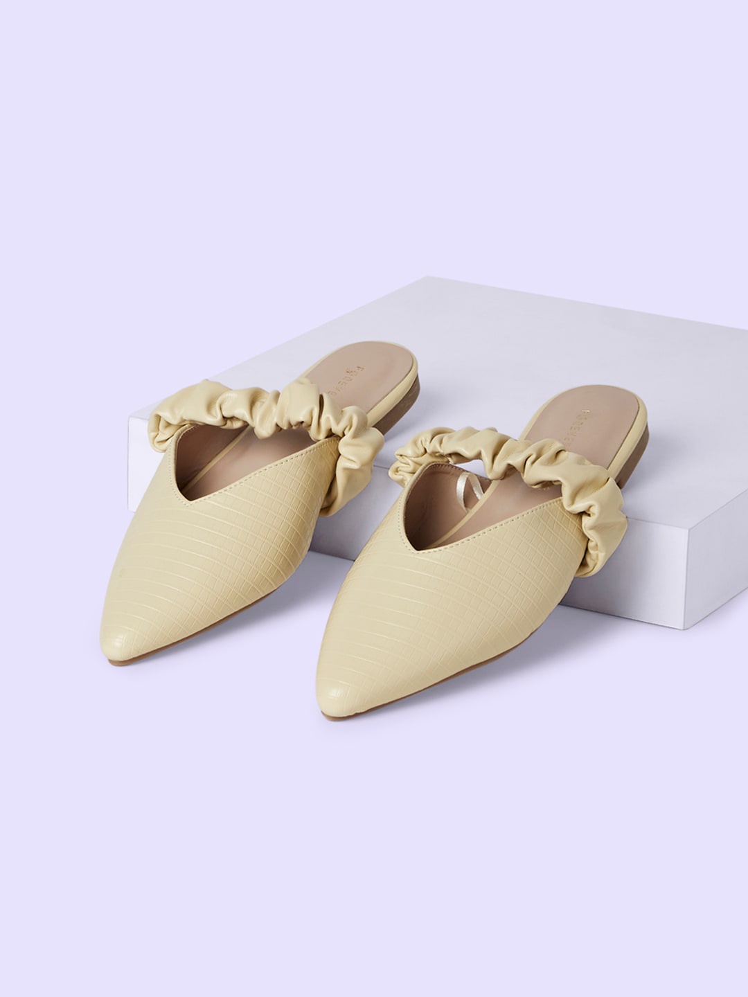

Forever Glam by Pantaloons Textured Pointed Toe Mules, Yellow