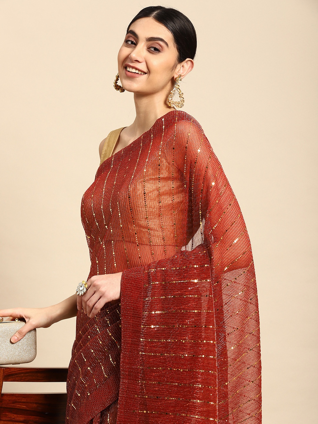 

Pothys Embellished Striped Sequinned Pure Georgette Saree, Rust