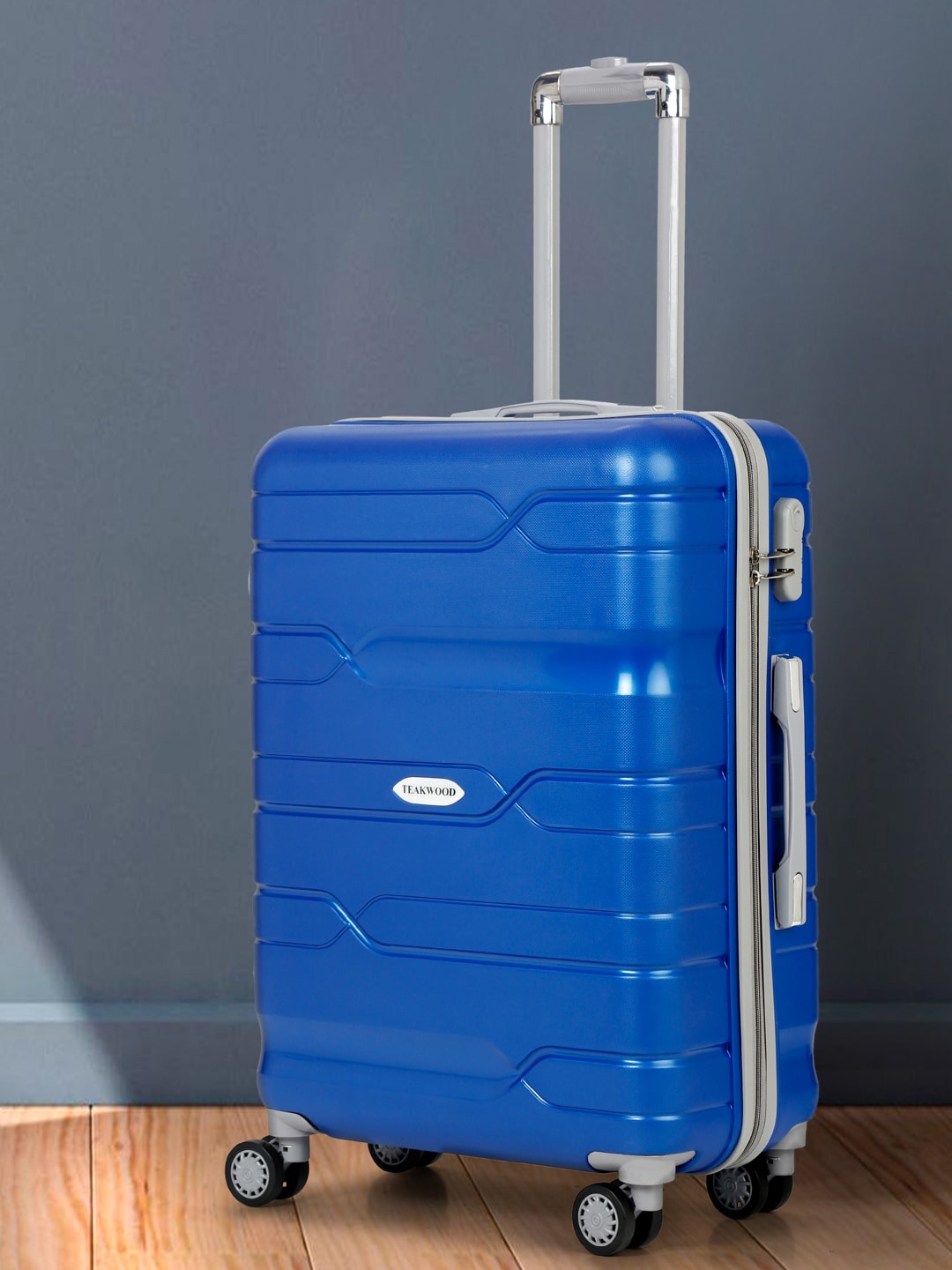

Teakwood Leathers Textured 360 Degree Rotation Hard Medium-Sized Trolley Bag -65 CM, Blue
