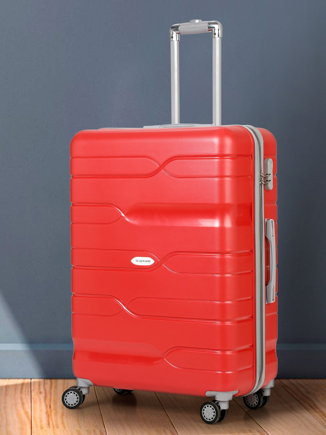 

Teakwood Leathers Textured 360 Degree Rotation Hard Large-Sized Red Trolley Bag -75 CM