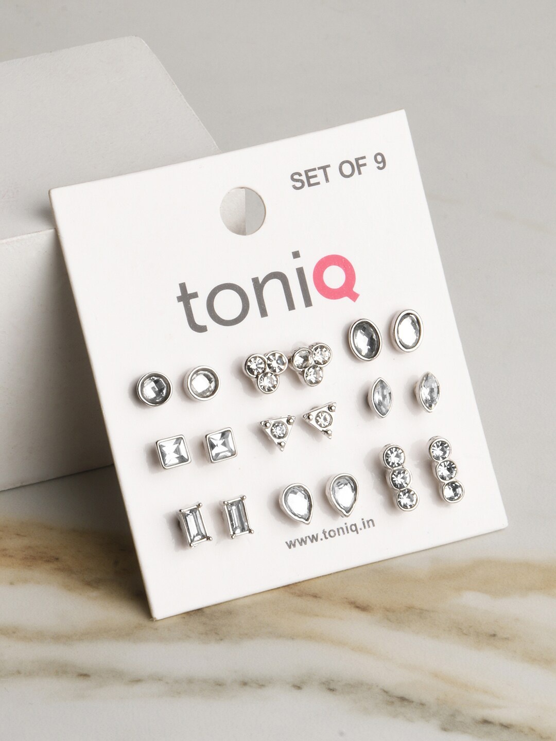 

ToniQ Set of 9 Silver-Plated Studs Earrings, White