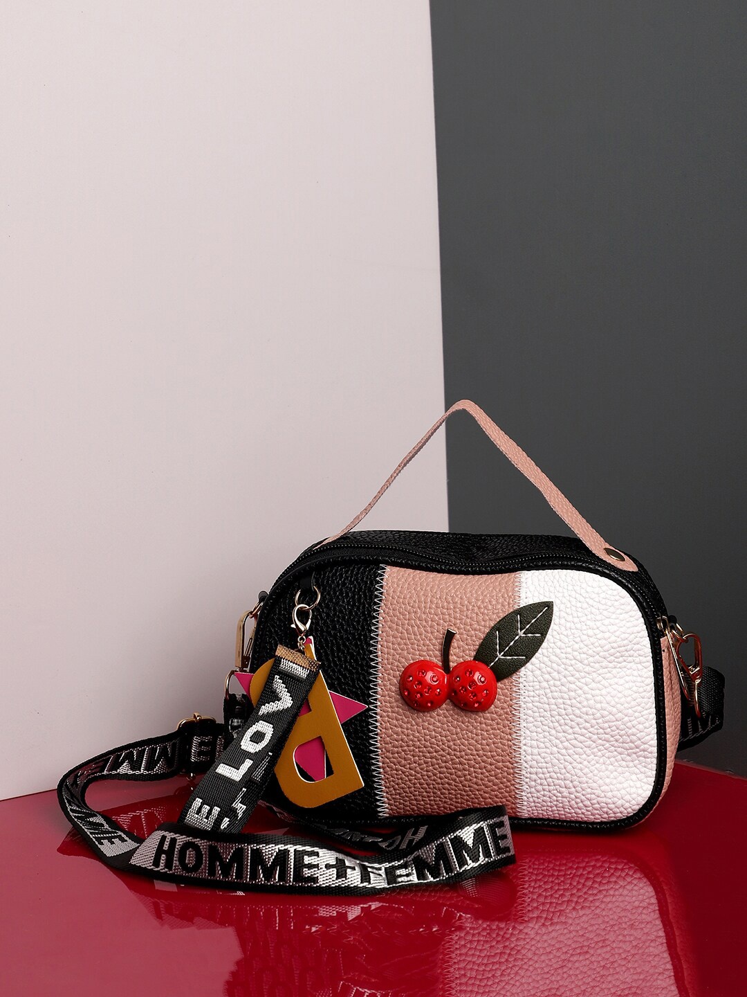 

HAUTE SAUCE by Campus Sutra Structured Sling Bag with Applique, Black