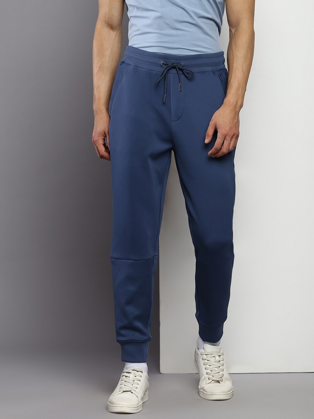 

Calvin Klein Jeans Men Mid Rise Joggers, Blue