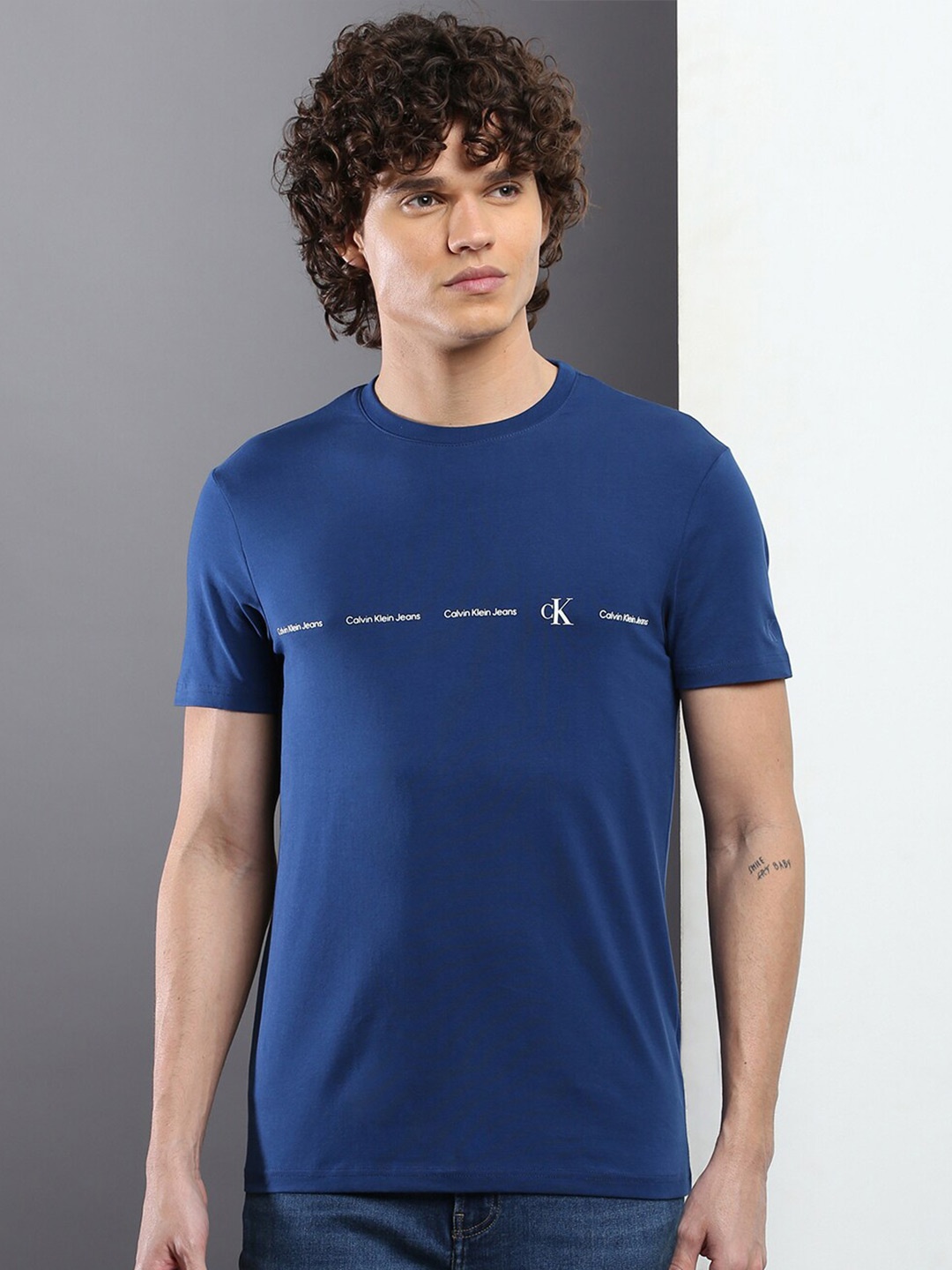 

Calvin Klein Jeans Typography Printed Slim Fit Round Neck T-shirt, Navy blue