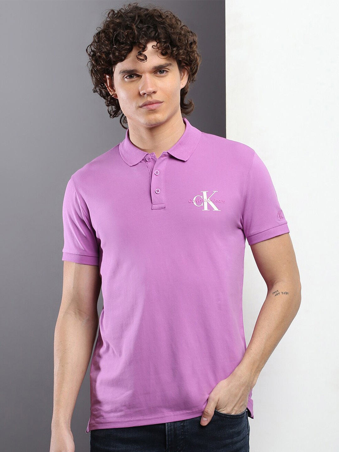 

Calvin Klein Jeans Men Purple Polo Collar Applique Slim Fit T-shirt