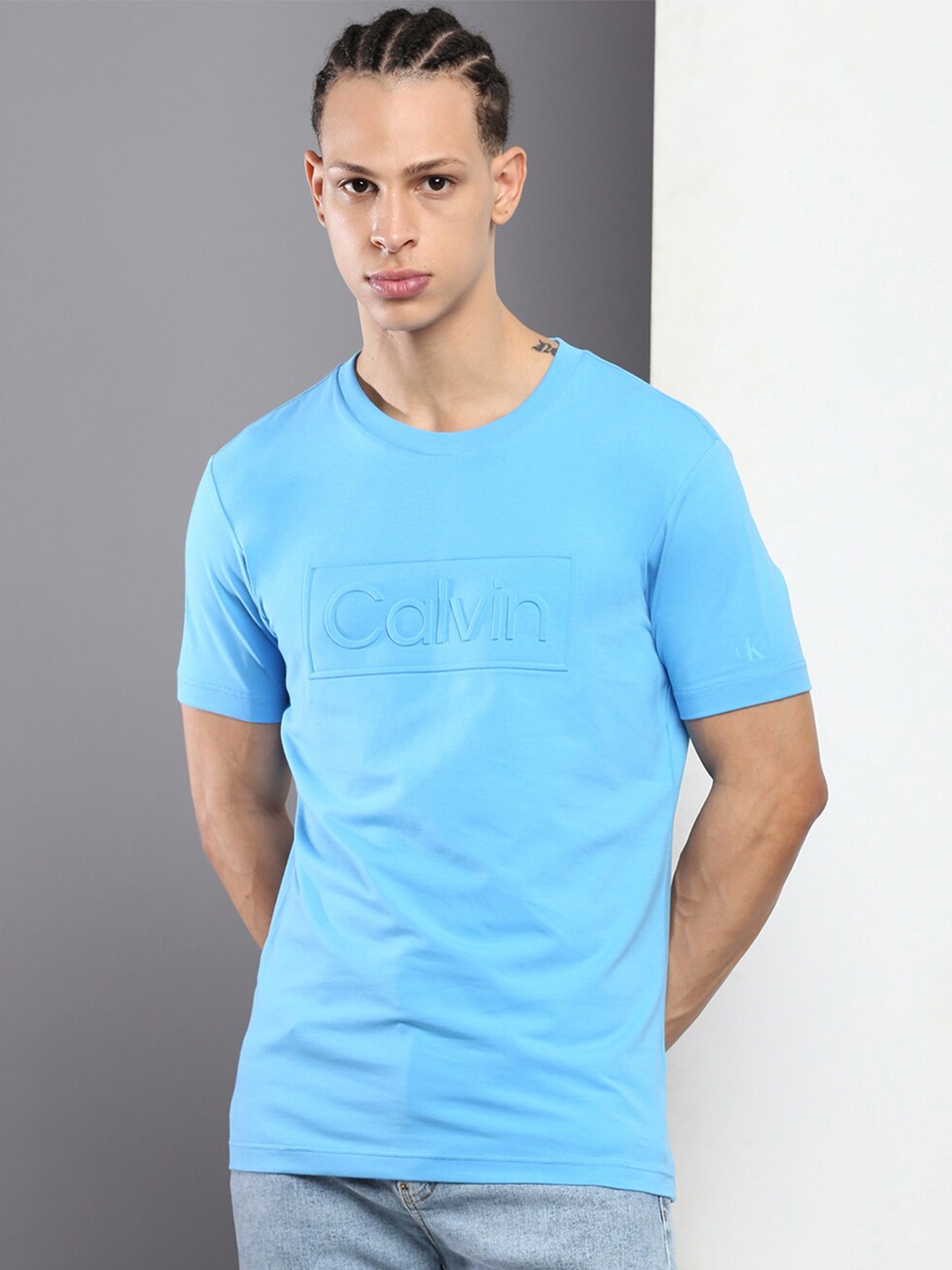 

Calvin Klein Jeans Men Typography Slim Fit Cotton T-shirt, Blue
