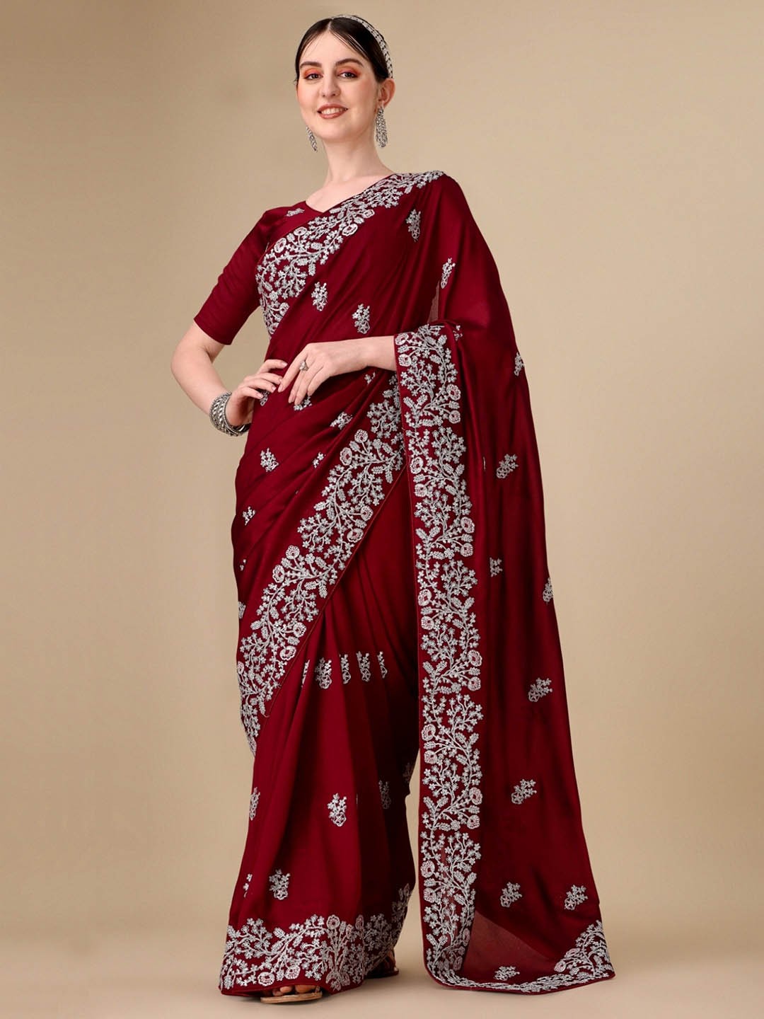 

Vaidehi Fashion Floral Embroidered Silk Blend Saree, Maroon
